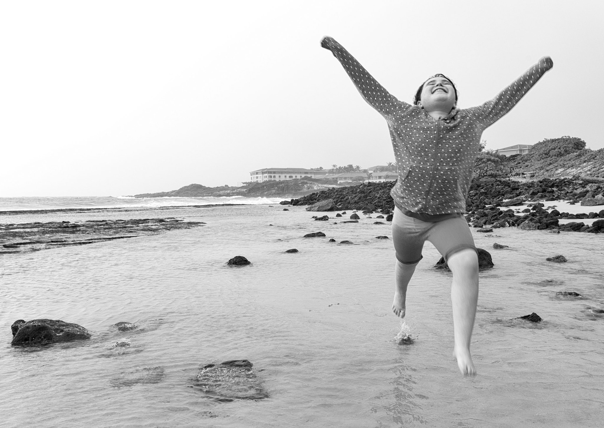 Canon EF 16-35mm F4L IS USM sample photo. Zoe really loved playing in the rain in kauai photography