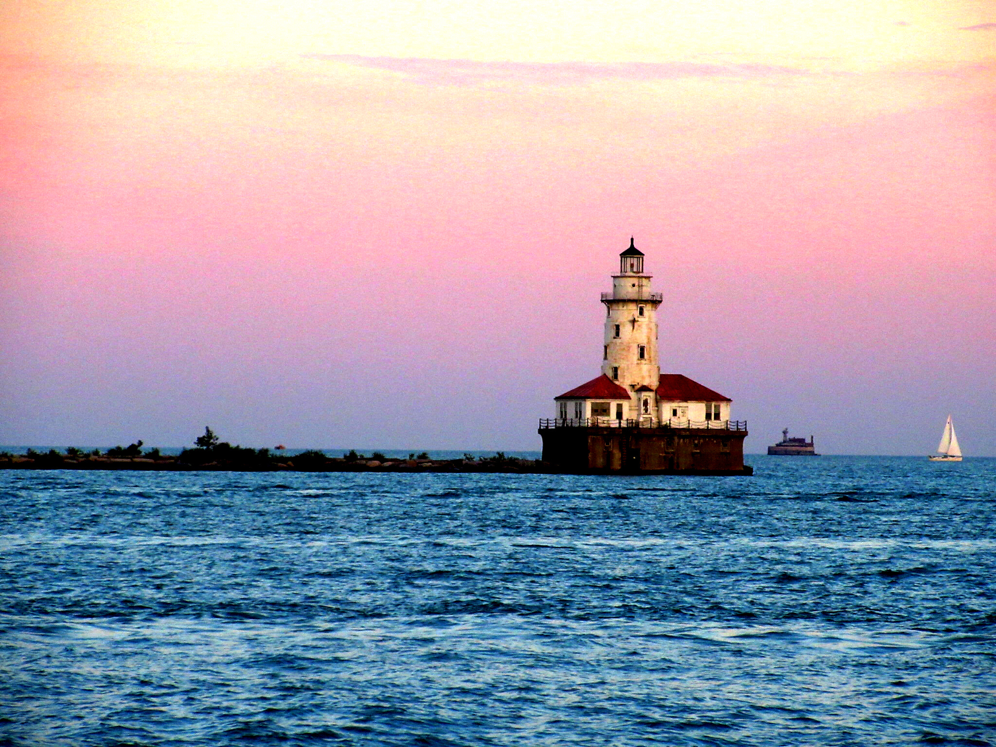Canon PowerShot ELPH 360 HS (IXUS 285 HS / IXY 650) sample photo. Lighthouse on lake michigan taken from navy pier. photography