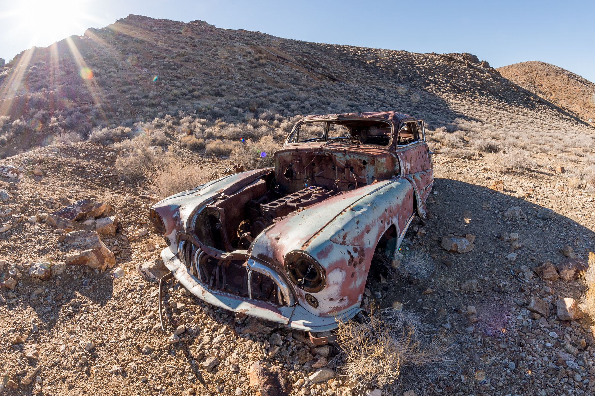 Nikon D4 + Samyang 12mm F2.8 ED AS NCS Fisheye sample photo. Old car left behind photography