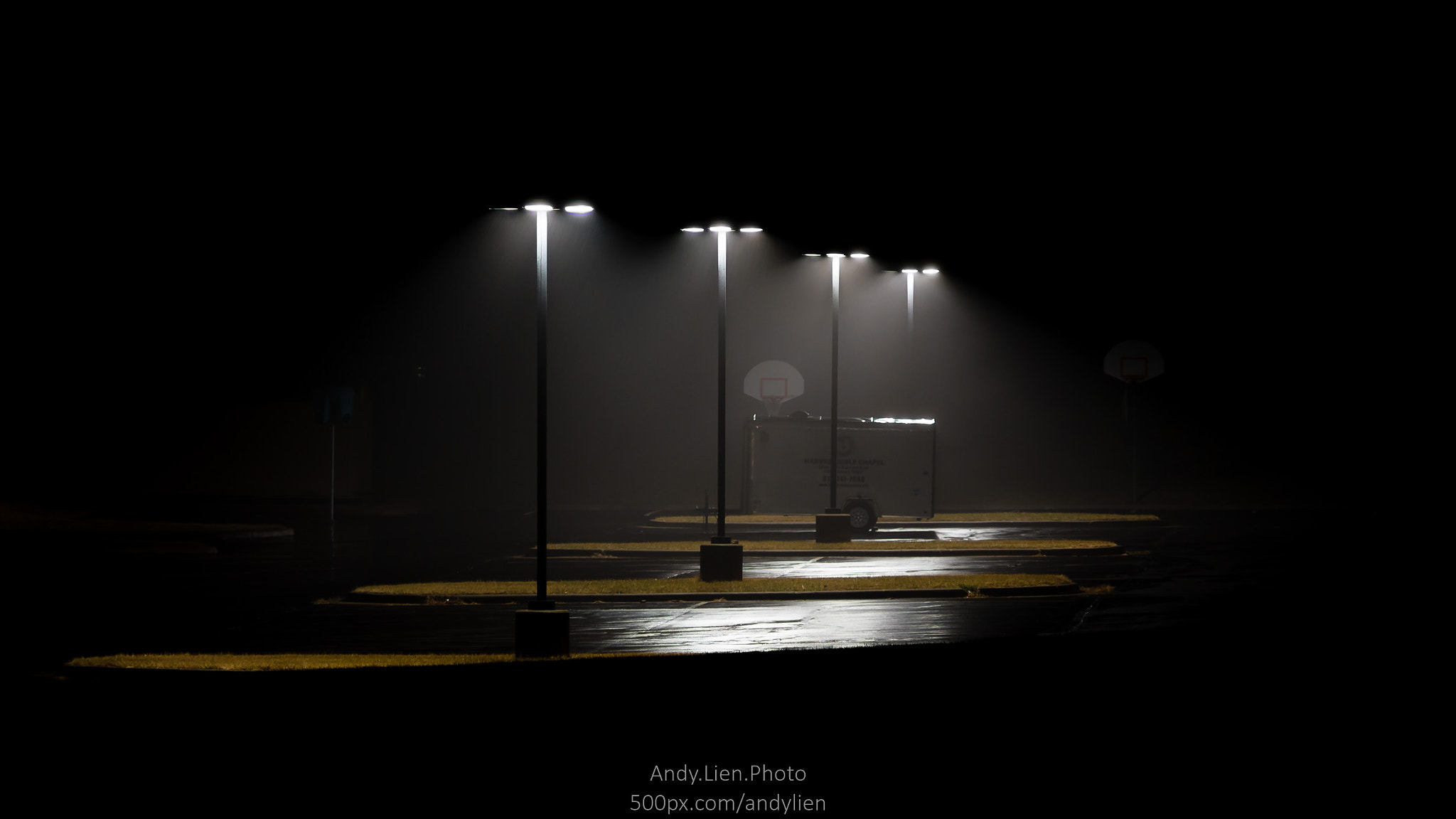 Minolta AF 70-210mm F4 Macro sample photo. A misty parking lot in kansas photography