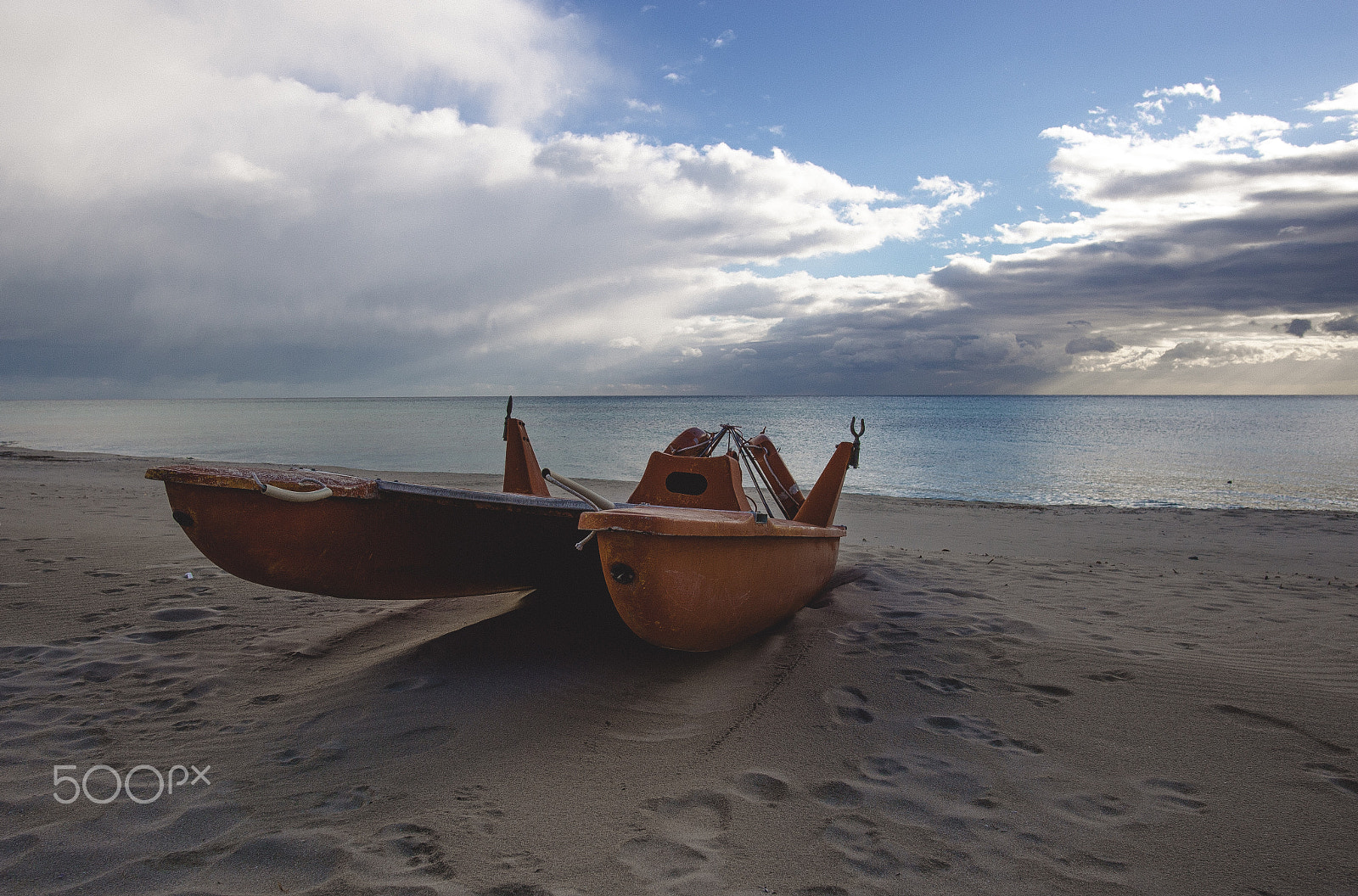 Nikon D3 sample photo. Red lifeguard boat photography