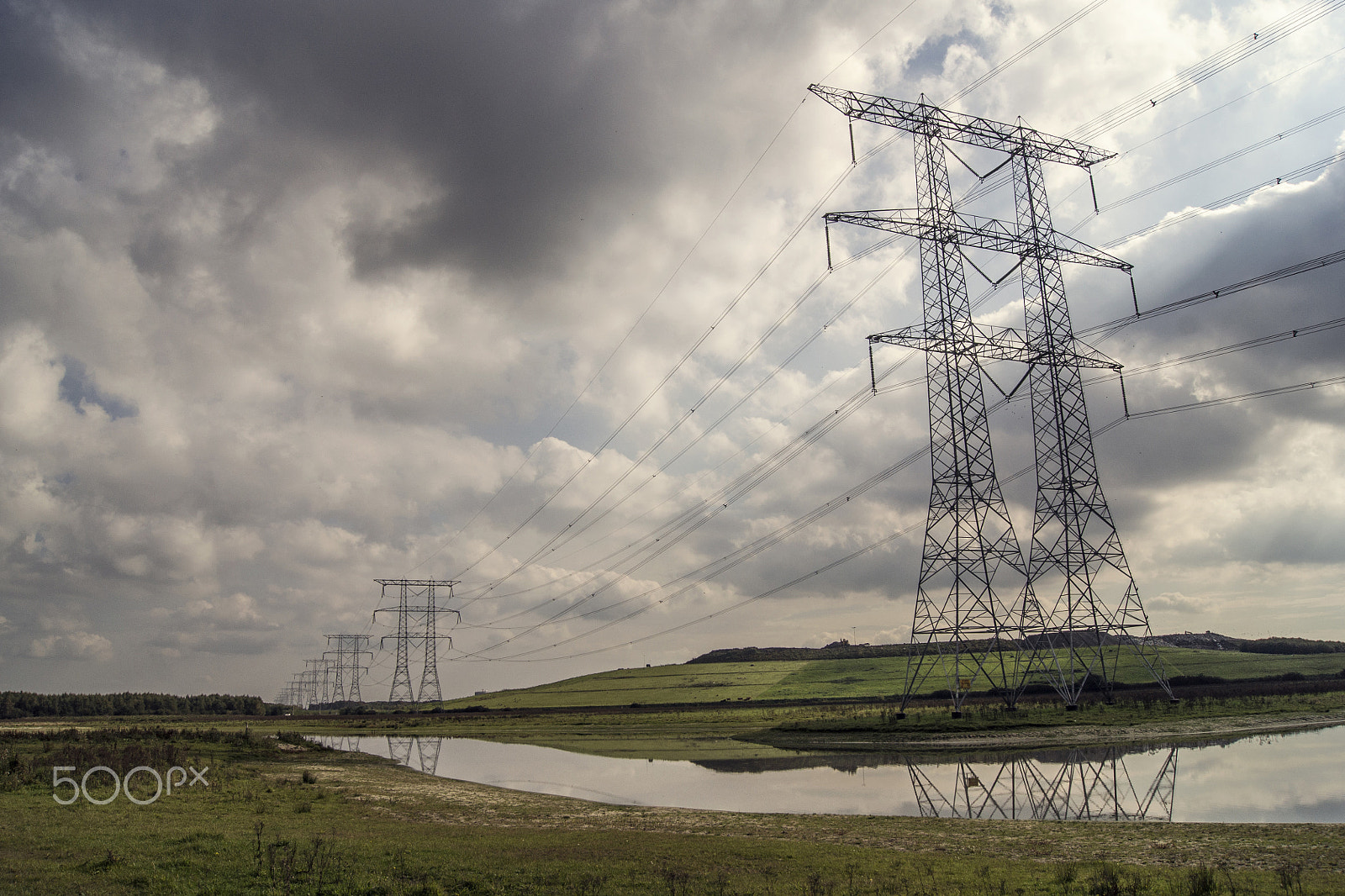 Sony Alpha DSLR-A500 sample photo. Electricity pylons in a row photography