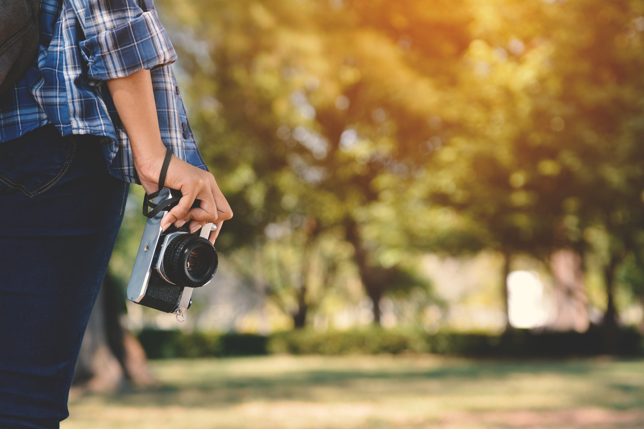 Nikon AF-S Nikkor 24-70mm F2.8G ED sample photo. Asian women holding a camera in nature and relax time on holiday.concept travel color of vintage... photography