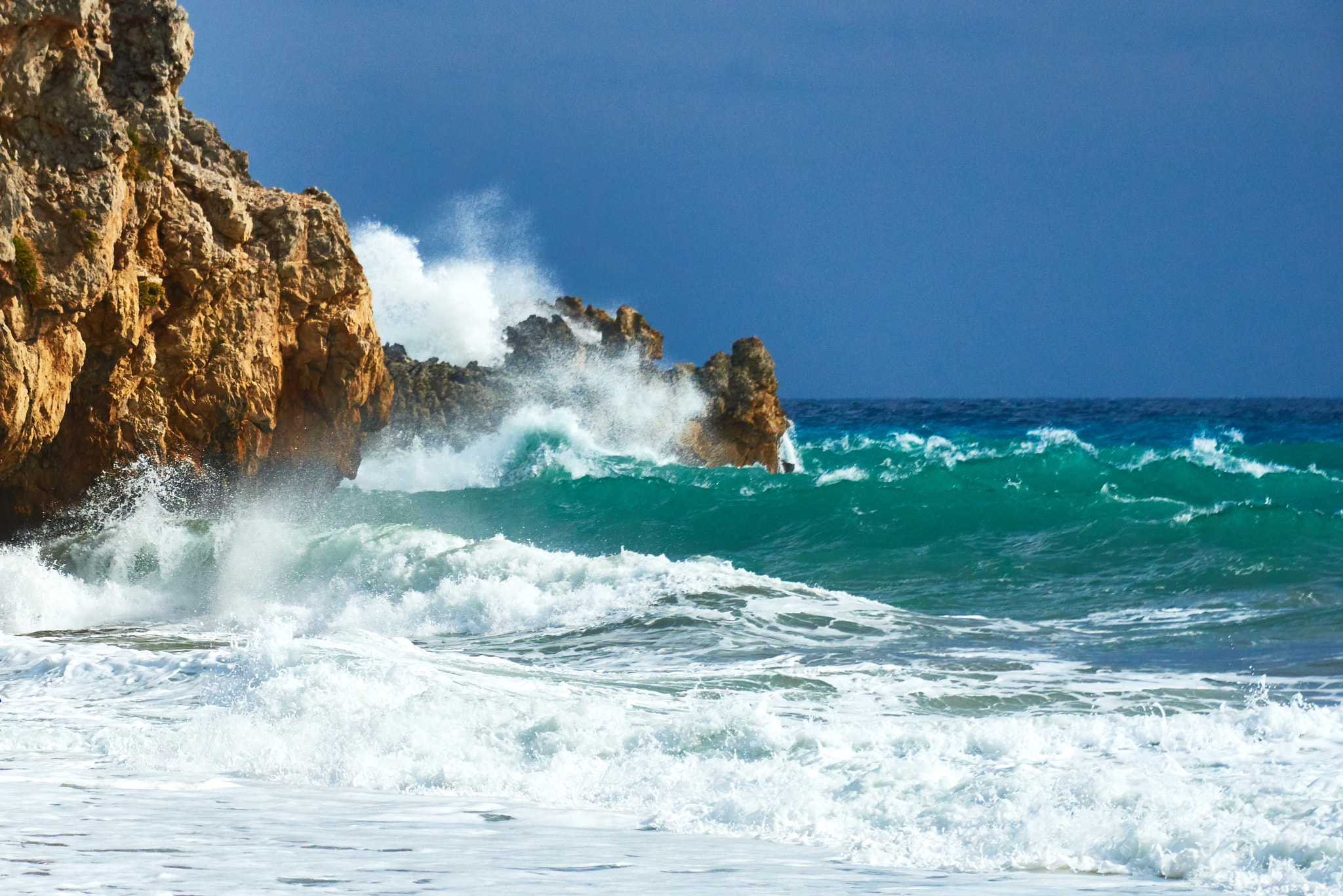 Nikon AF-S Nikkor 28-300mm F3.5-5.6G ED VR sample photo. Cruel sea batters the coast of crete photography