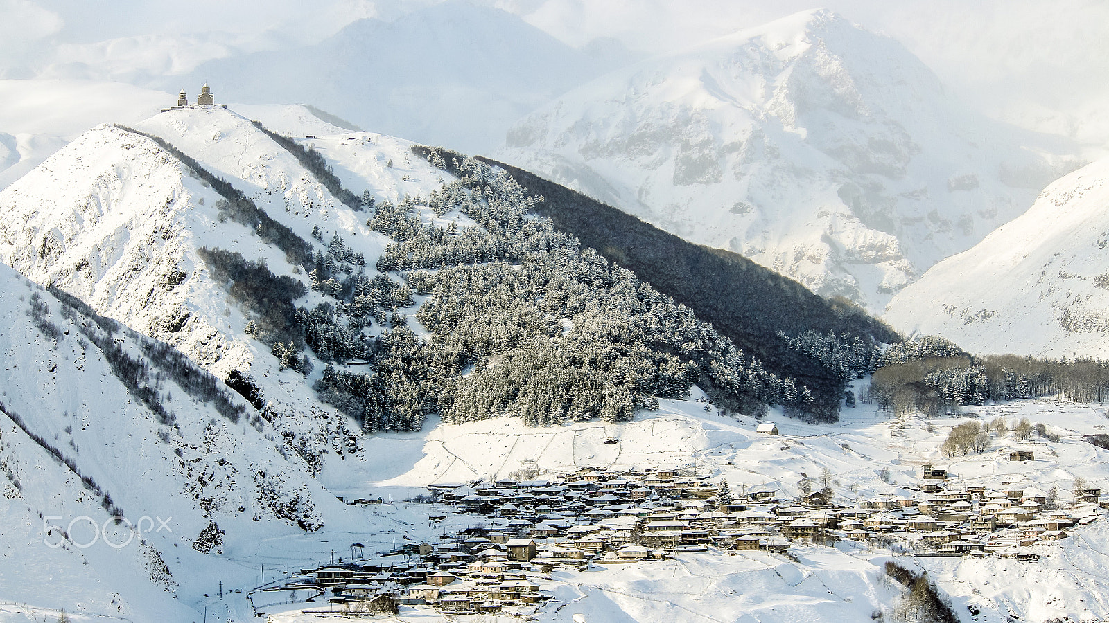 Canon EF-S 55-250mm F4-5.6 IS sample photo. Wintertime in kazbegi photography
