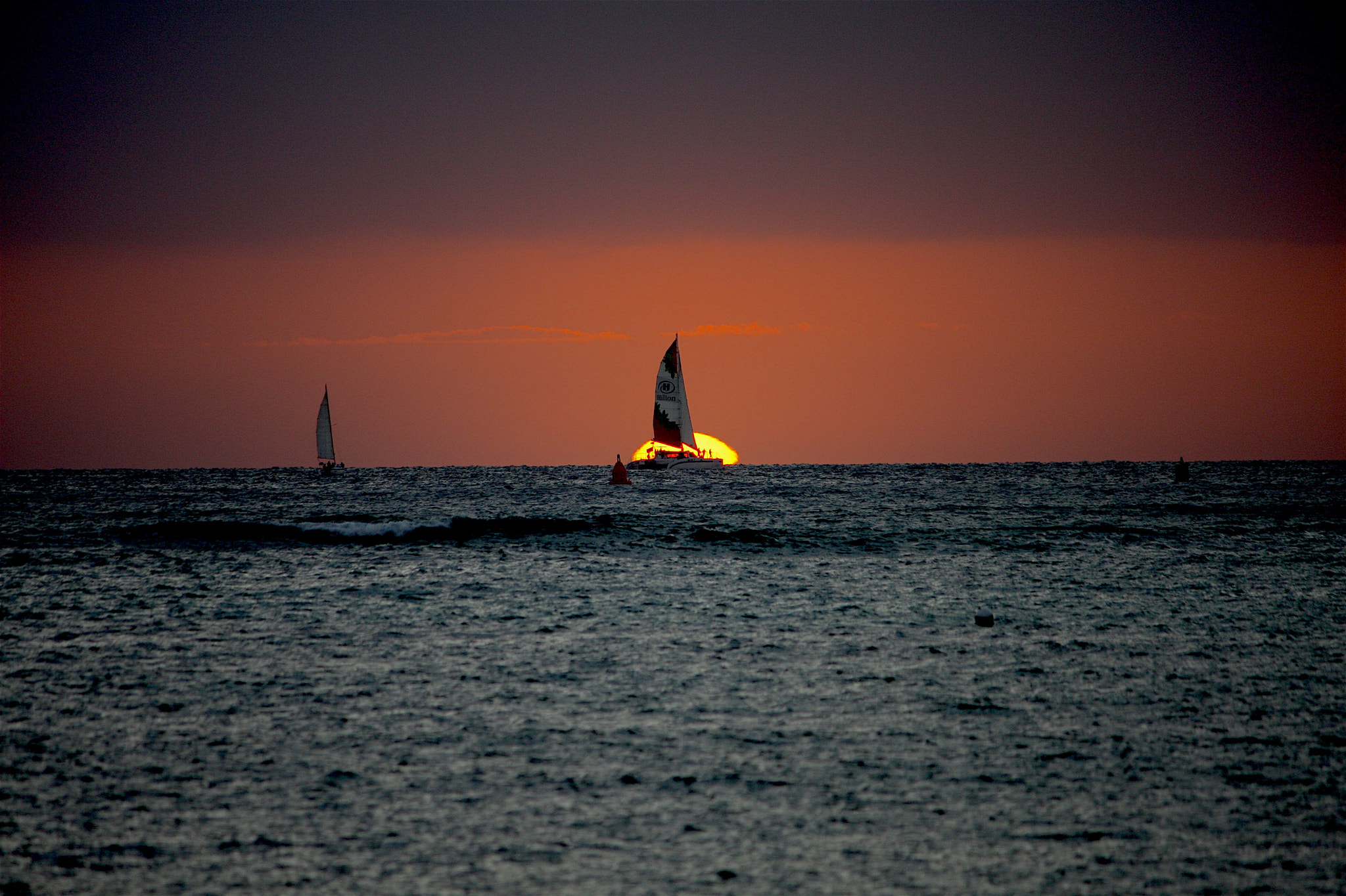 Canon EF-S 55-250mm F4-5.6 IS sample photo. Sail into the sun photography