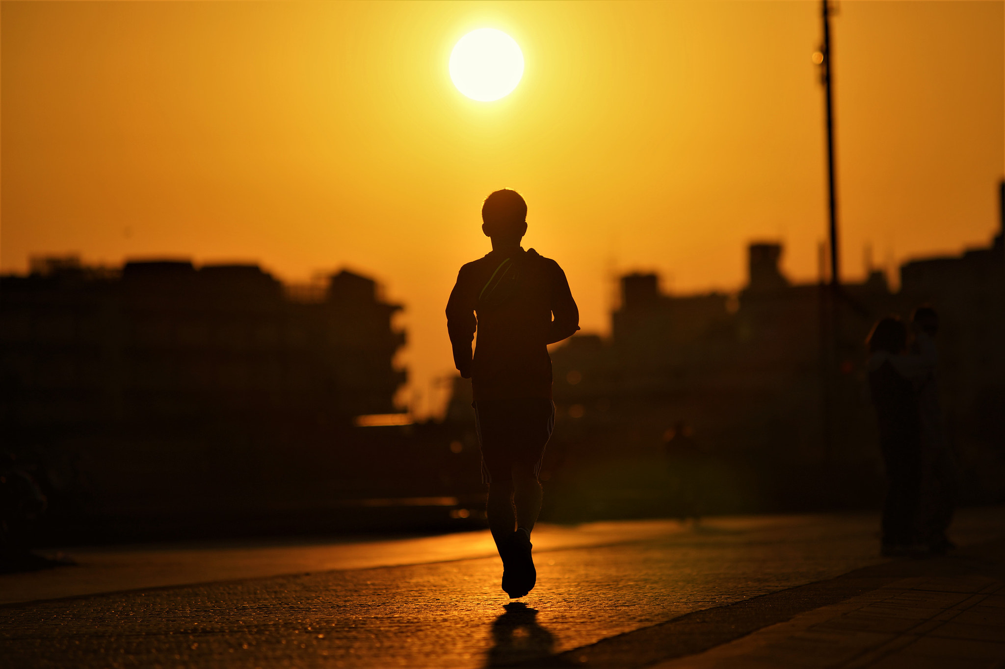 Minolta/Sony AF 70-200mm F2.8 G sample photo. Running to the sun photography