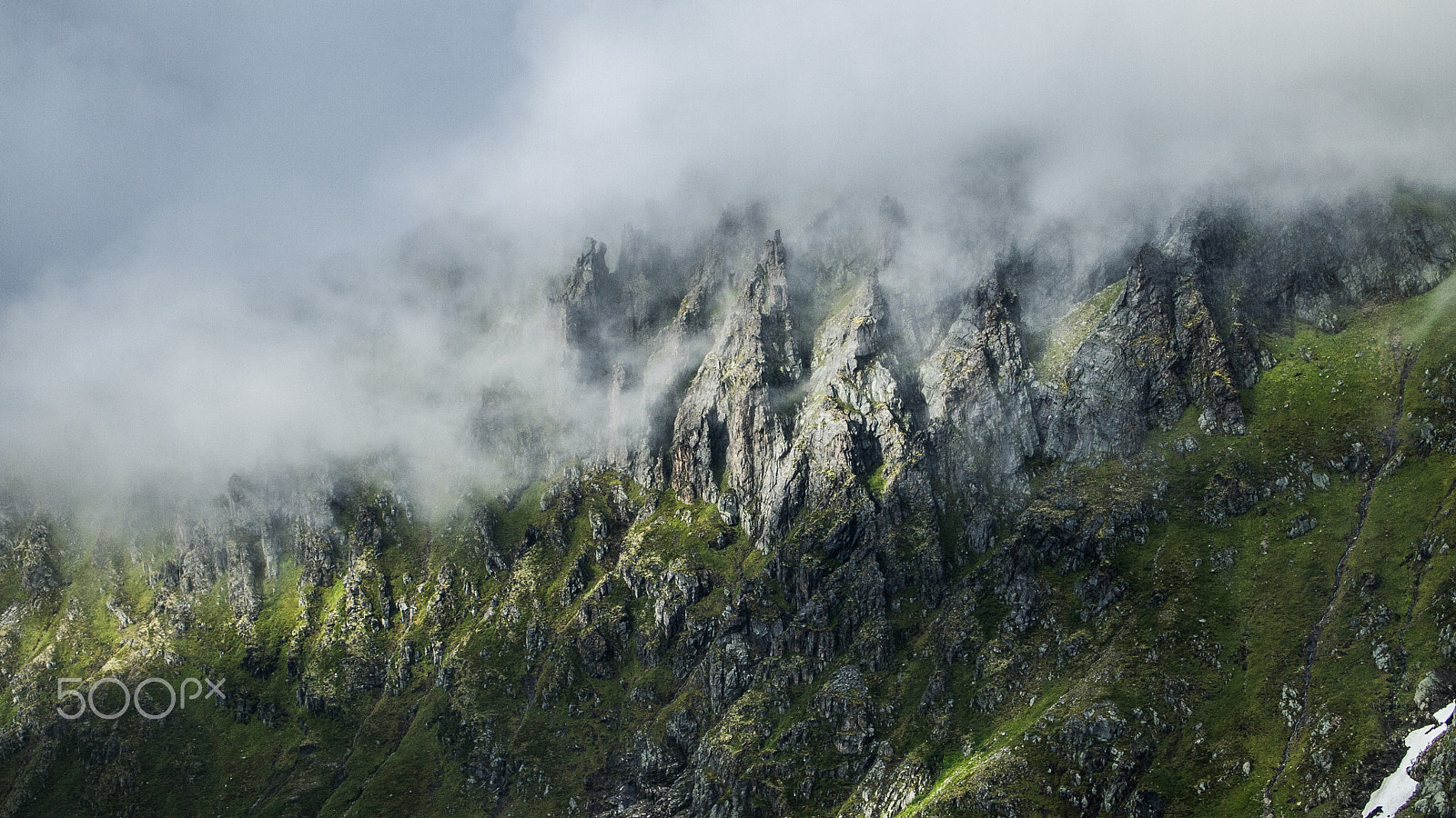 Olympus PEN E-PL1 sample photo. Mountain ridge covered in mist photography