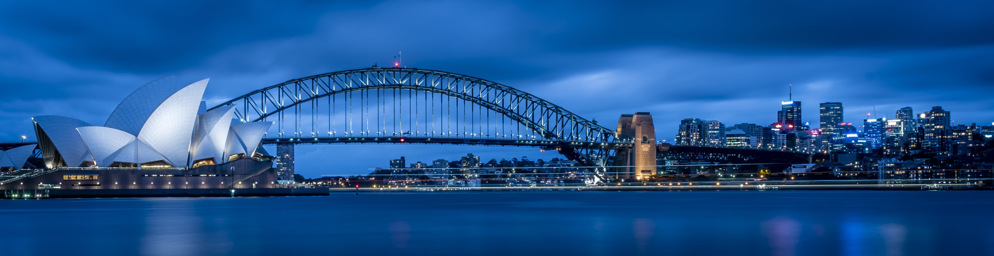 Nikon D810 sample photo. Sydney harbour bridge and opera house with the manly ferry going through the image. photography