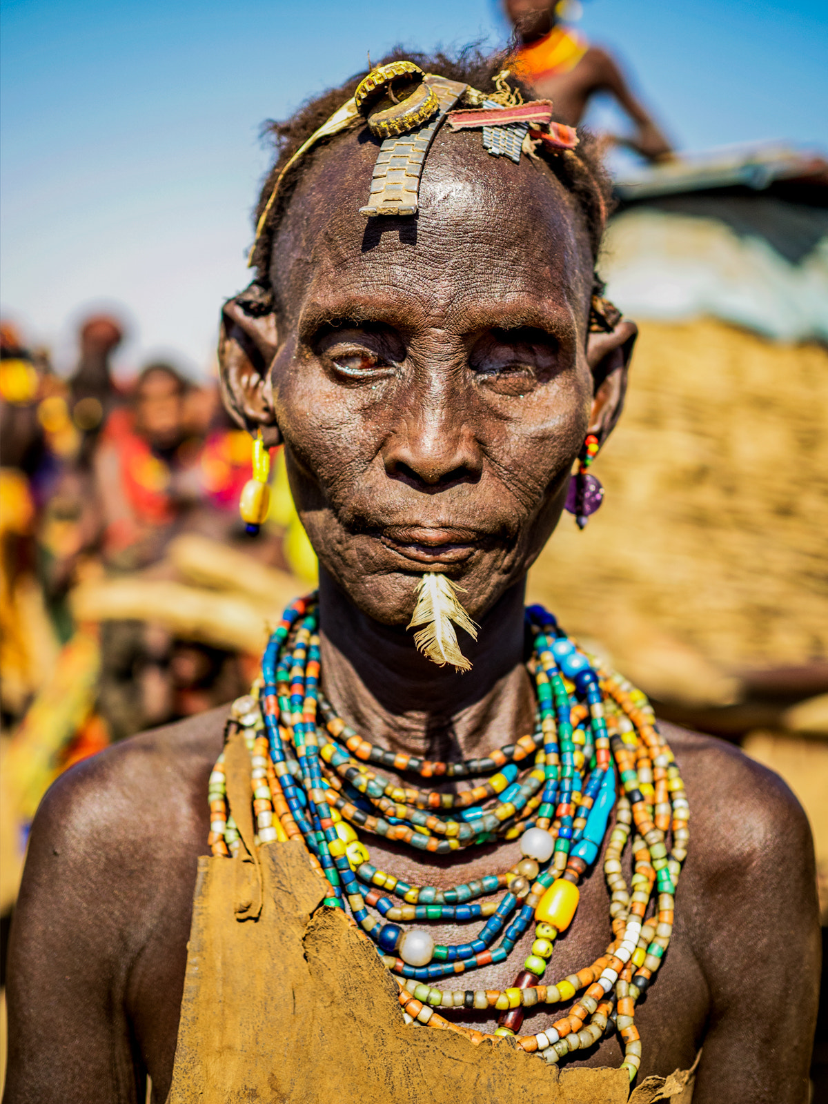 Olympus OM-D E-M1 + Olympus M.Zuiko Digital 25mm F1.8 sample photo. Blind woman from the dassanech tribe photography