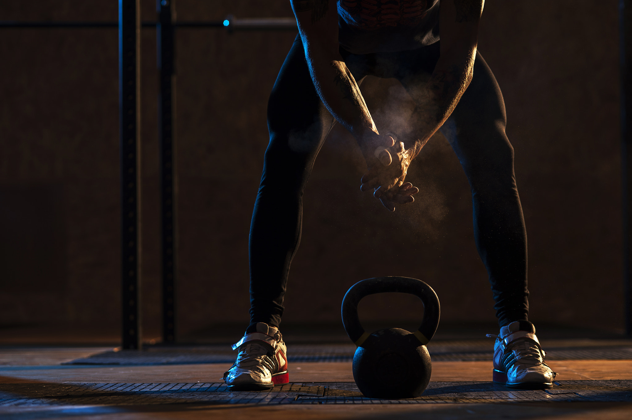 Nikon D700 + AF Micro-Nikkor 105mm f/2.8 sample photo. Male muscular athlete exercising with kettlebell photography