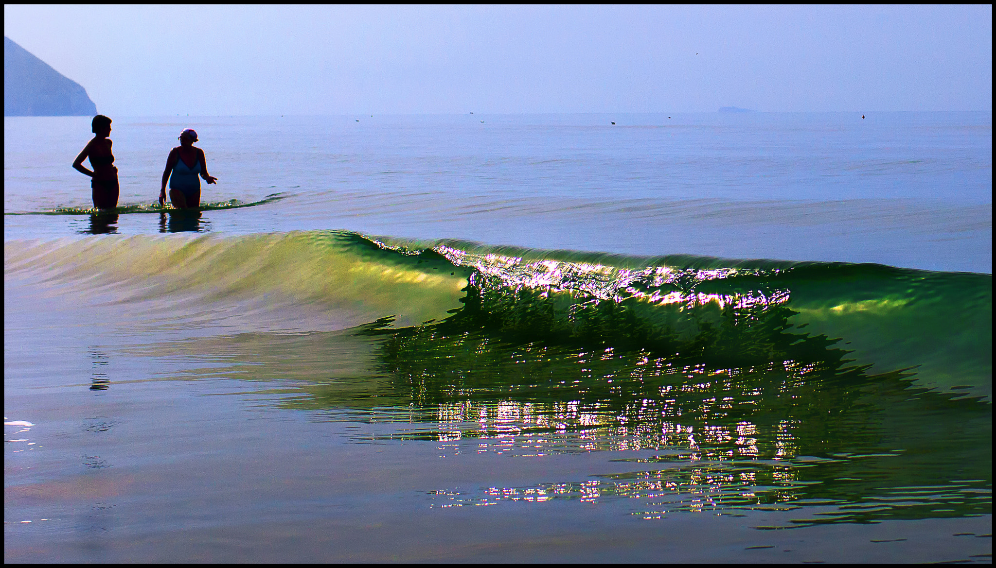 Canon EOS 60D + Canon EF 35mm F1.4L USM sample photo. Walking with the waves photography