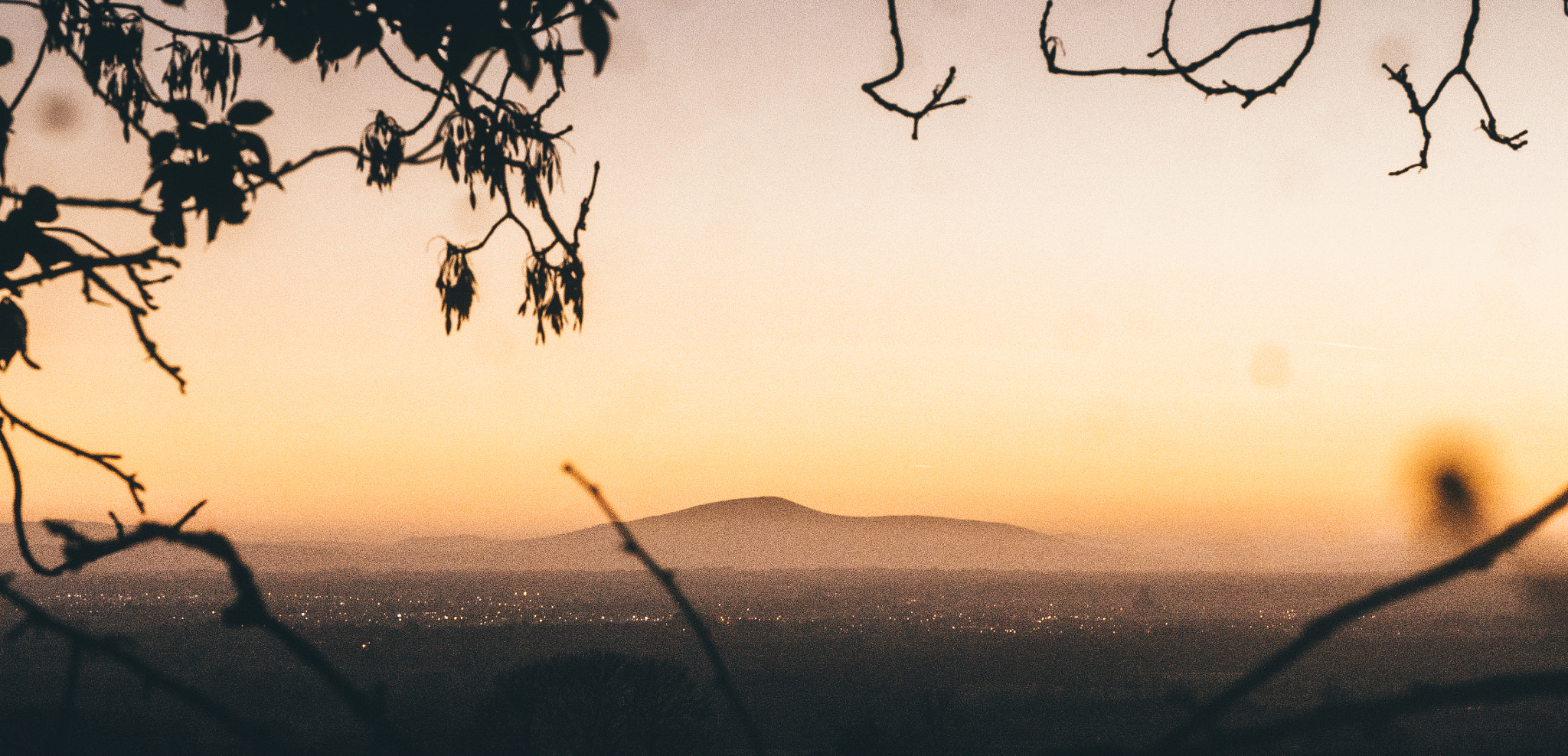 Panasonic Lumix DMC-GH4 sample photo. City below the mountain photography