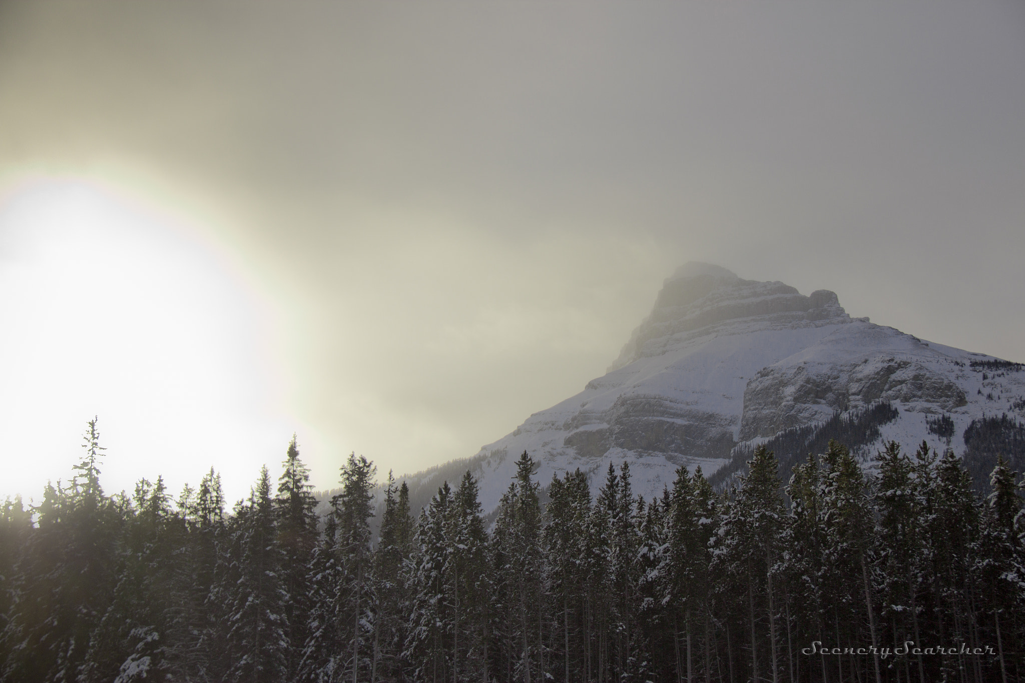 Canon EF-S 18-200mm F3.5-5.6 IS sample photo. A looming mountain photography