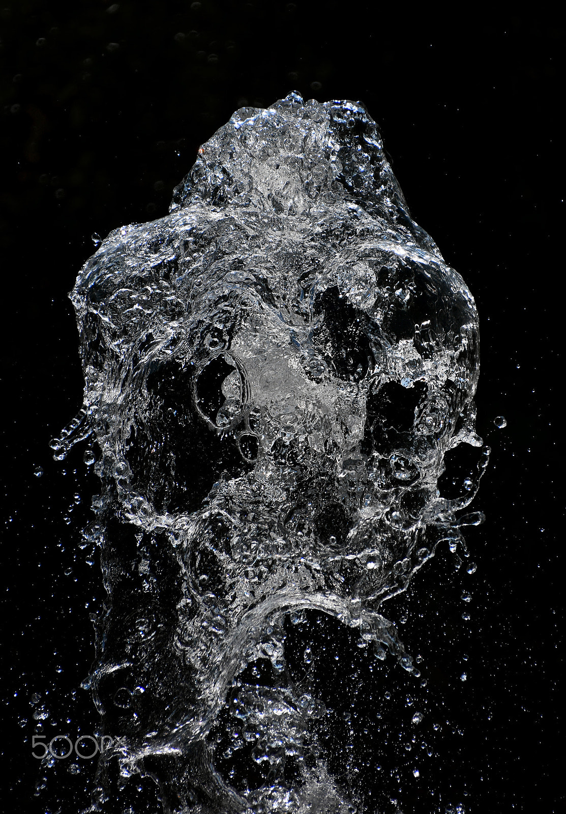 Nikon D5500 sample photo. Water stream with splash over black background photography