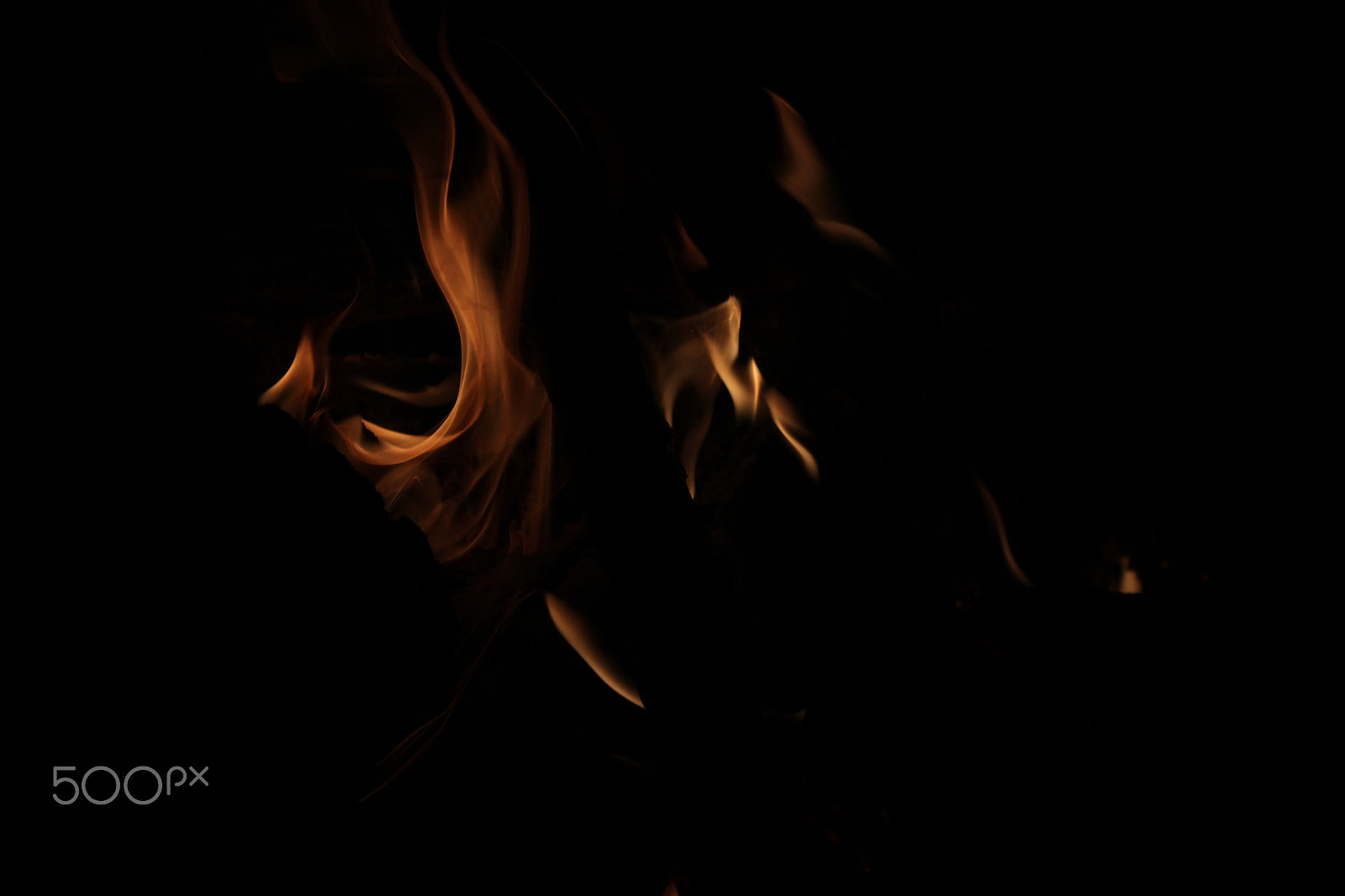 Canon EF-S 18-55mm F3.5-5.6 IS sample photo. Flames with black background photography