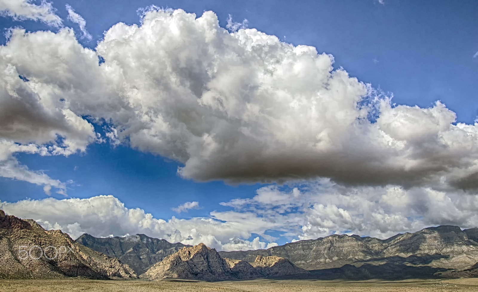 Olympus PEN E-PM2 sample photo. When the clouds are overbearing photography