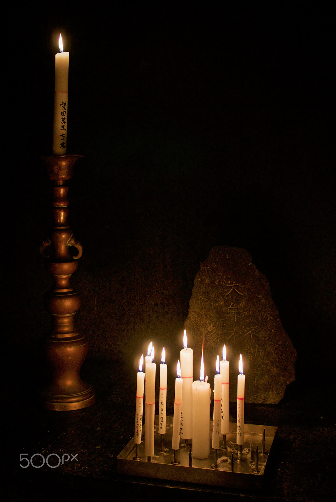 Nikon 1 J2 + Nikon 1 Nikkor 18.5mm F1.8 sample photo. Votive candles at a local shrine photography