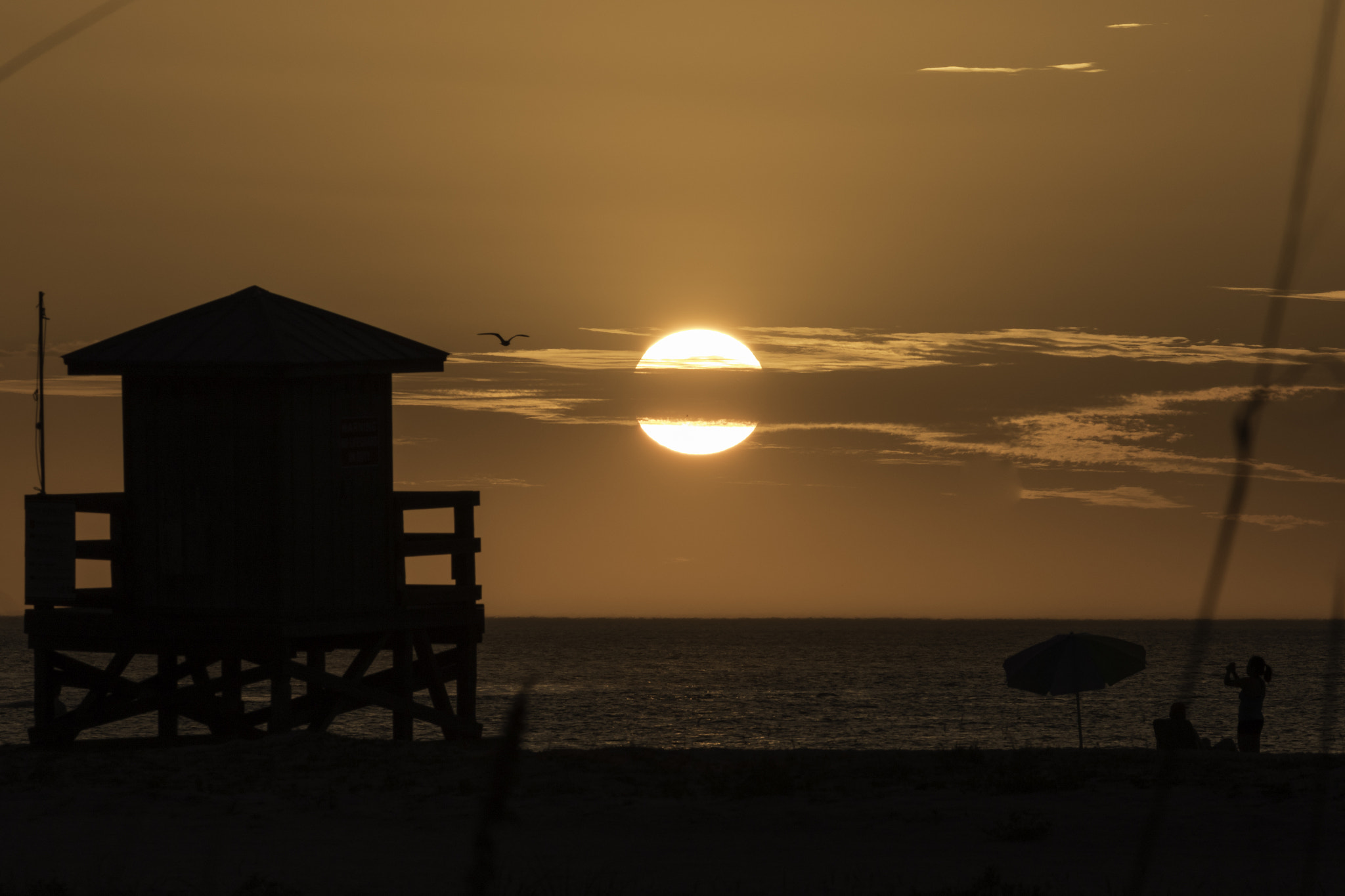 Canon EF-S 55-250mm F4-5.6 IS II sample photo. Lifeguard's hut - silhouette photography