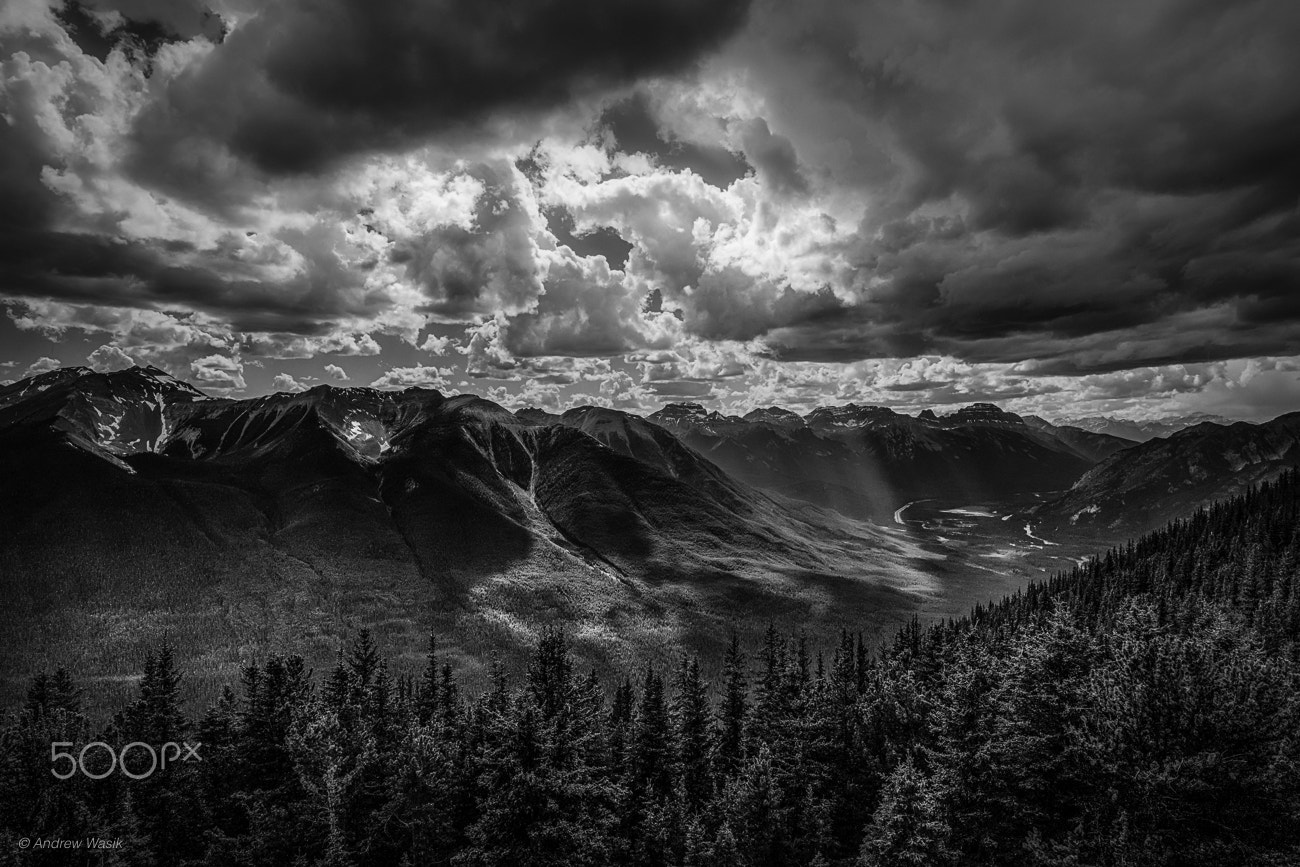 E 21mm F2.8 sample photo. Sunrays through the clouds photography