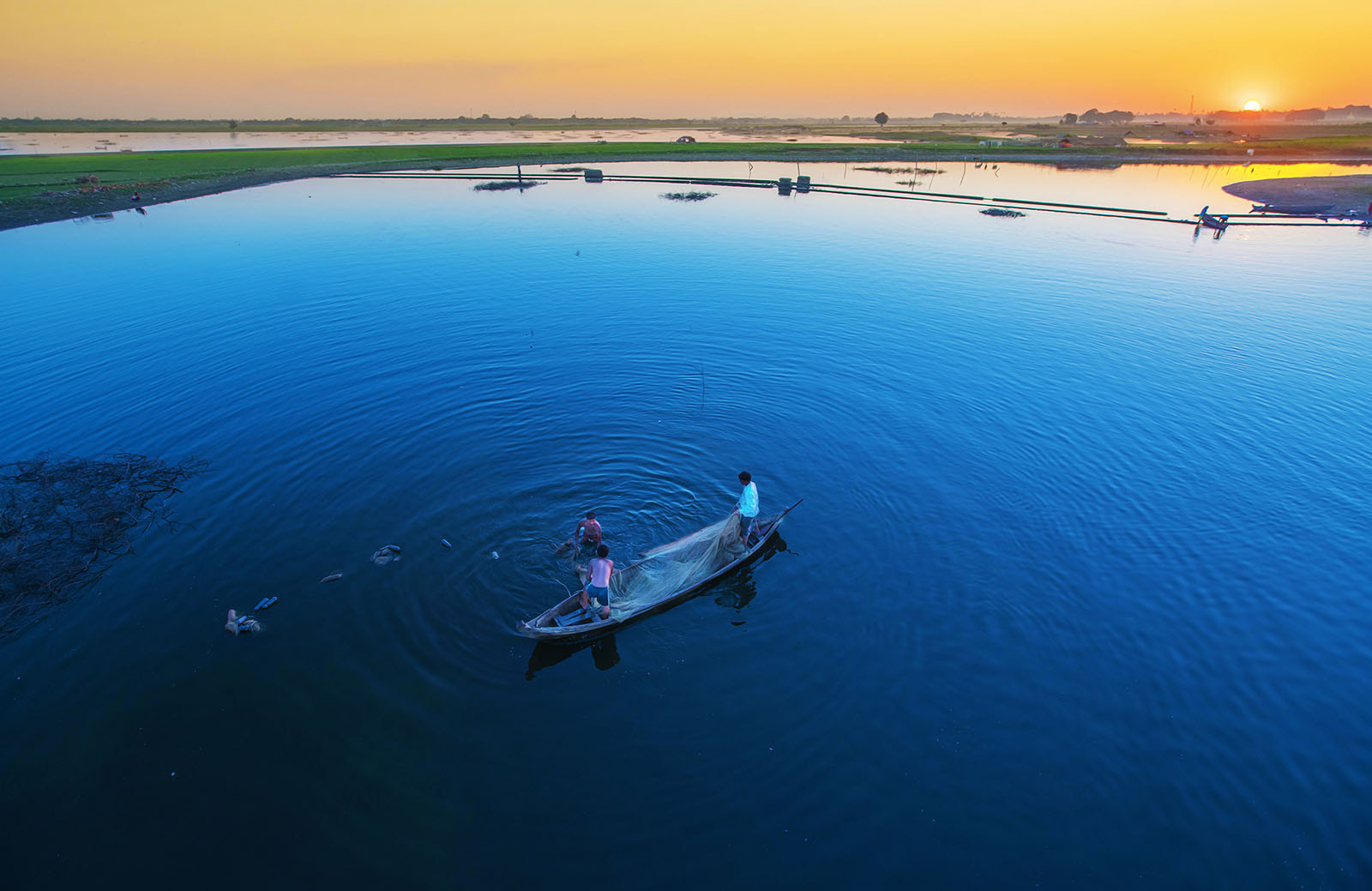 Sony a7R + Canon EF 16-35mm F2.8L II USM sample photo. Fishing boat in sunset photography