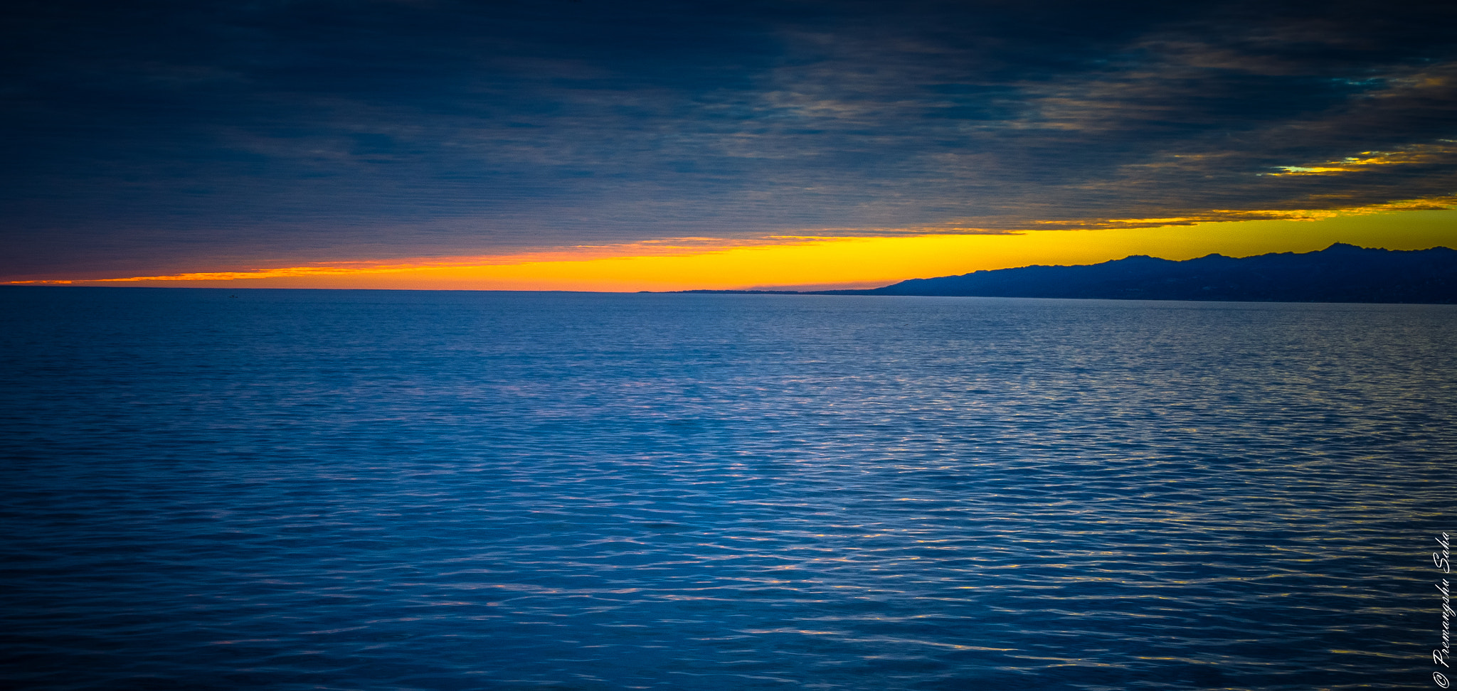 Olympus OM-D E-M10 + LUMIX G 25/F1.7 sample photo. The horizon during sunset photography