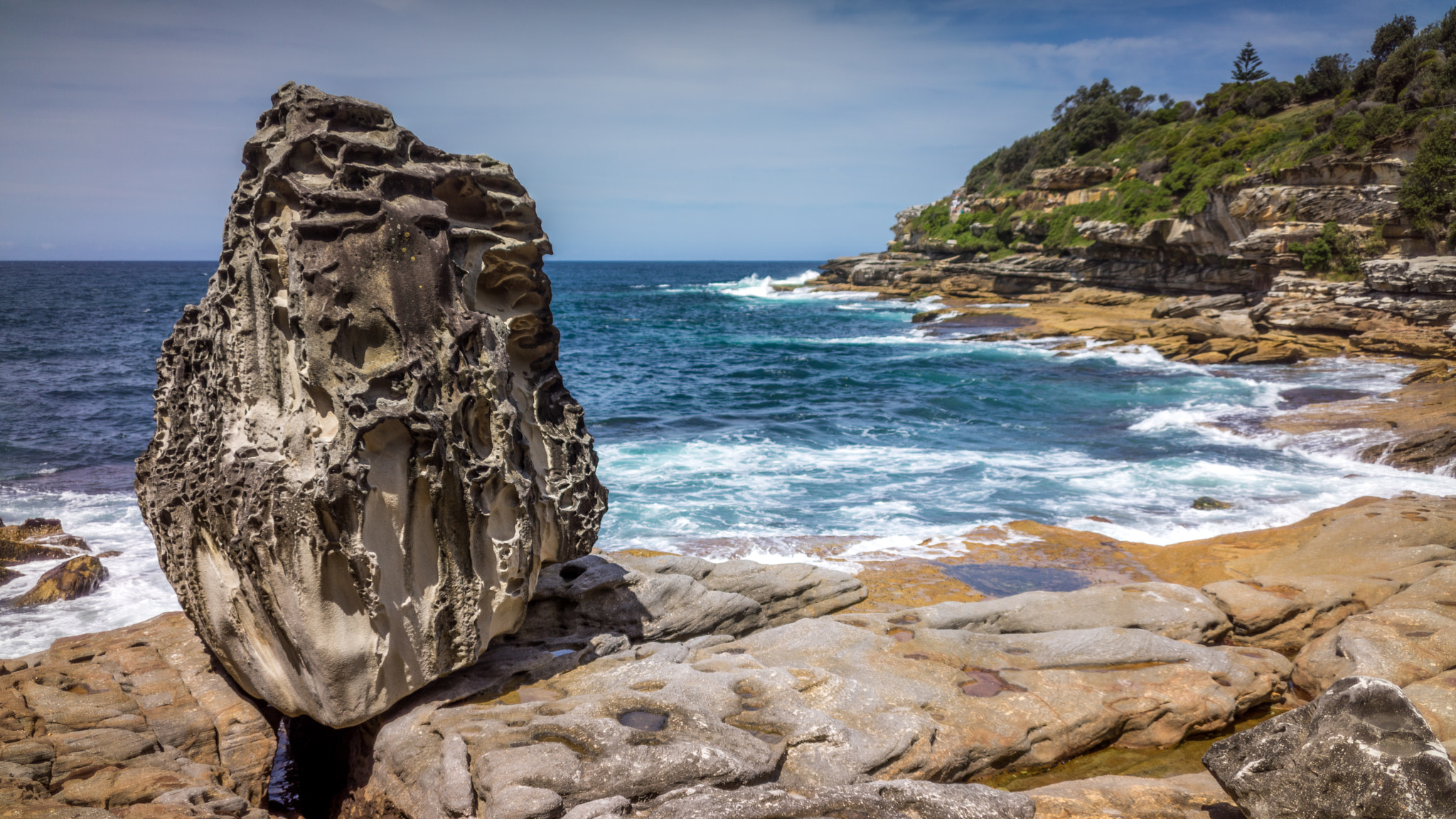 Sony a7R + E 35mm F2 sample photo. Rocks and water photography