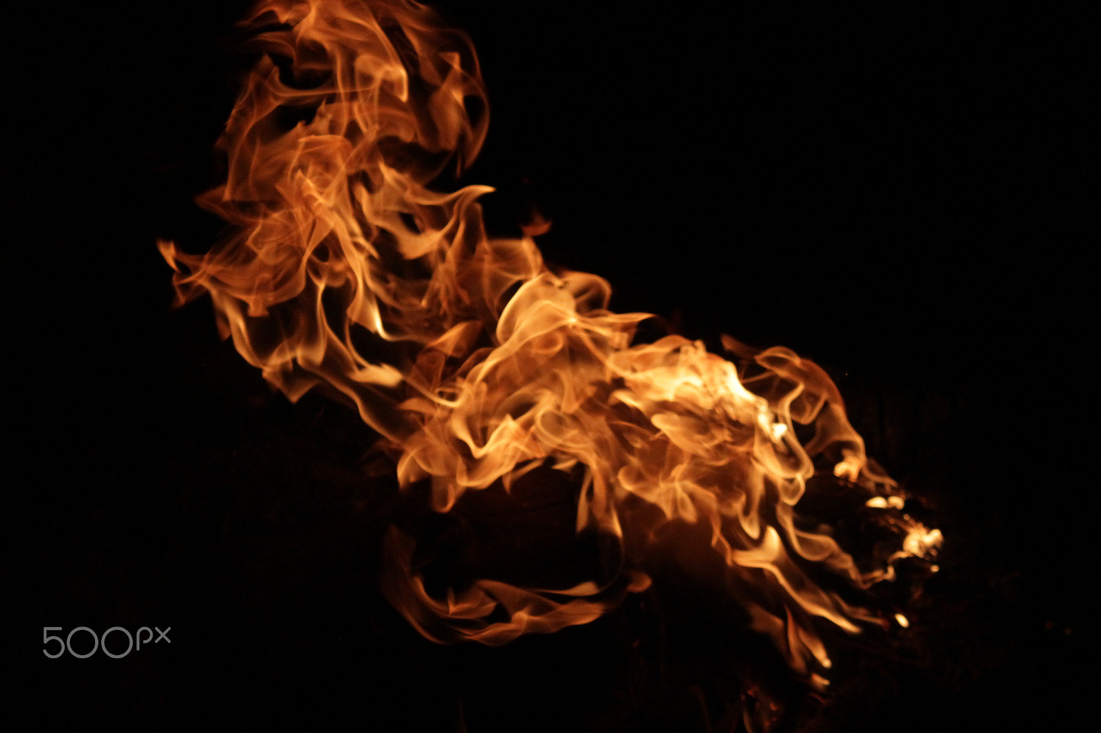 Canon EF-S 18-55mm F3.5-5.6 IS sample photo. Flames with black background photography