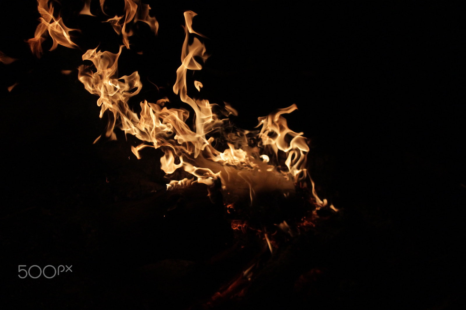 Canon EF-S 18-55mm F3.5-5.6 IS sample photo. Flames with black background photography