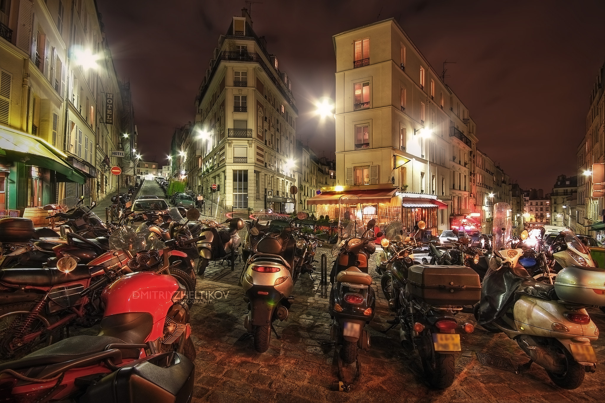 Canon EOS 40D sample photo. Parked motorcycles in the square on rue maurice utrillo at night photography