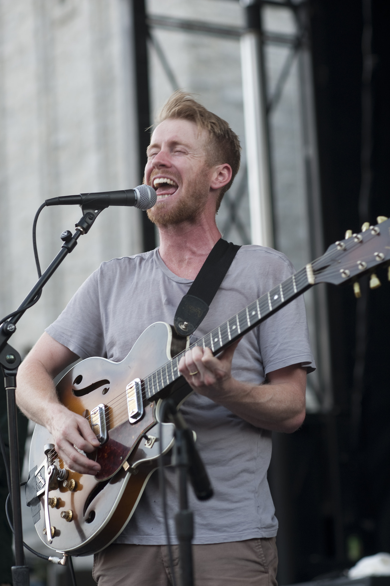 AF DC-Nikkor 135mm f/2 sample photo. Artscape arts festival, baltimore maryland 
cold war kids on stage, band member jonnie russell photography