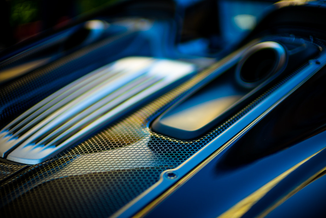Leica Noctilux-M 50mm F0.95 ASPH sample photo. Porsche 918 spyder, engine cover sunrise photography
