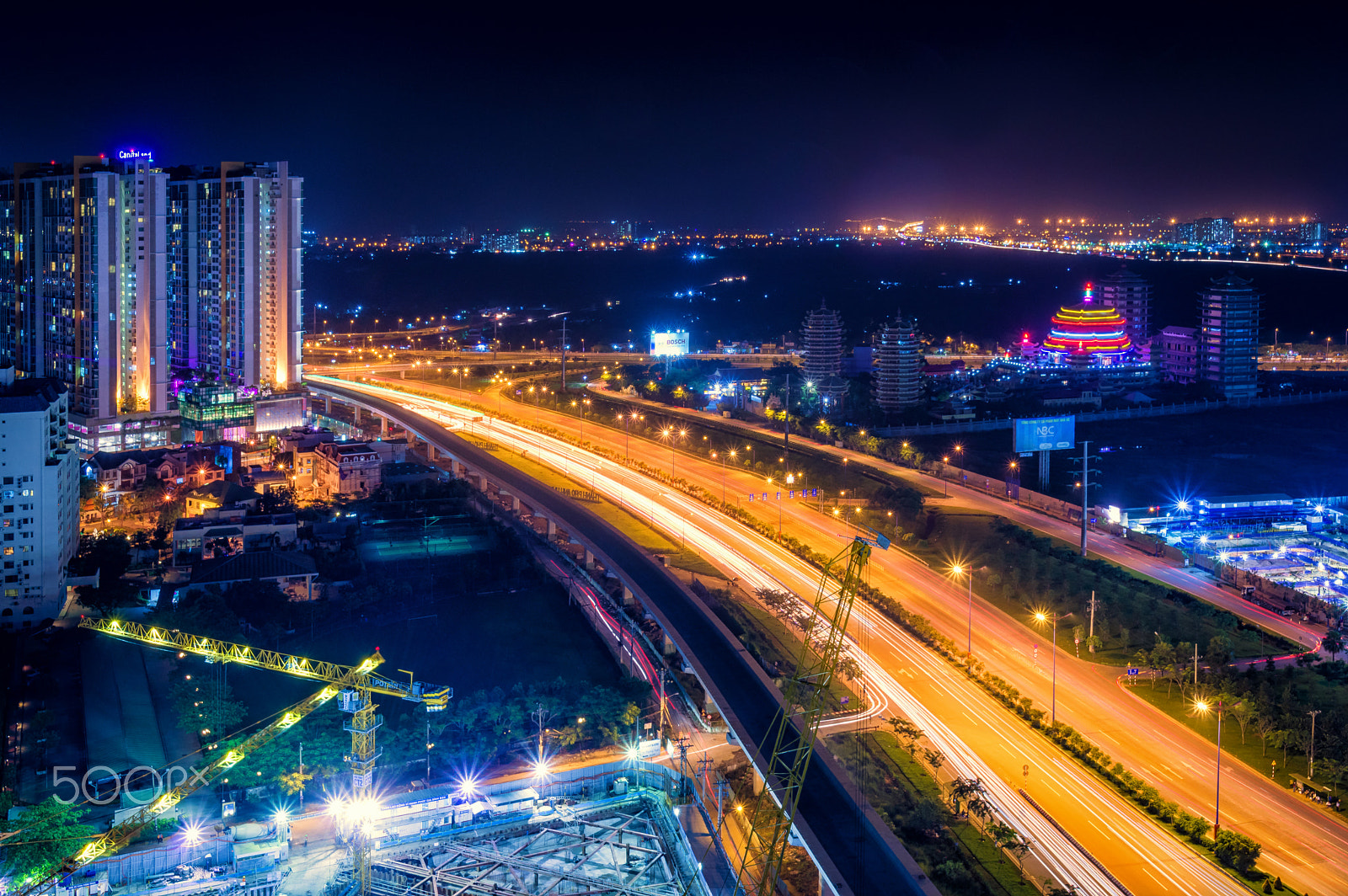 Sigma 17-50mm F2.8 EX DC HSM sample photo. Eastern saigon at night photography
