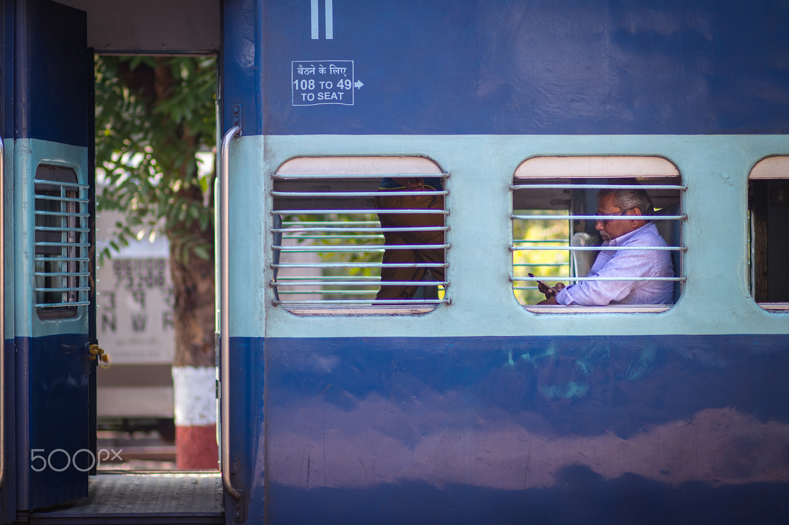 Canon EOS 80D + Canon EF 85mm F1.8 USM sample photo. Indian train window & door photography