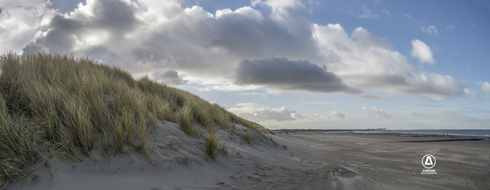 Nikon D3200 + Sigma 18-200mm F3.5-6.3 II DC OS HSM sample photo. North sea beach photography