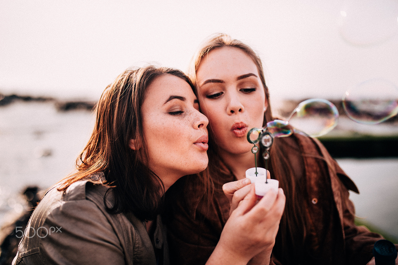Canon EOS 5DS sample photo. Teenage girls blowing bubbles together photography