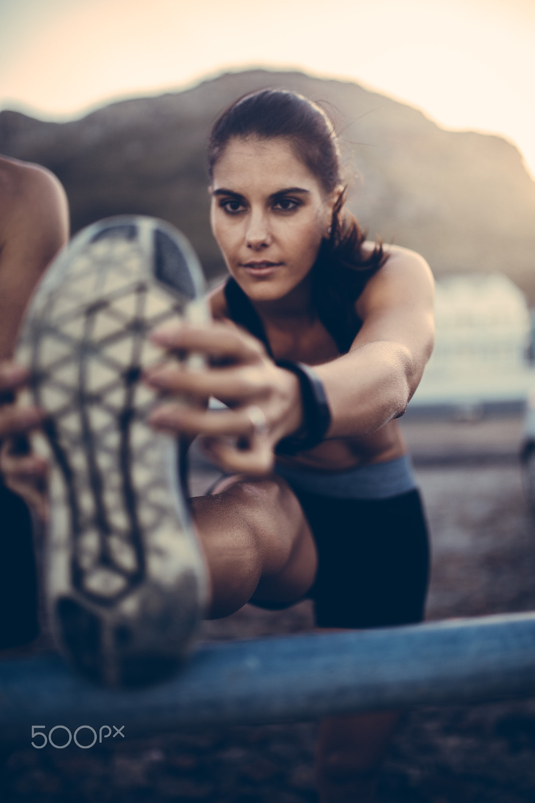 Canon EOS 5DS + Sigma 35mm F1.4 DG HSM Art sample photo. Caucasian female adult stretching legs after run photography