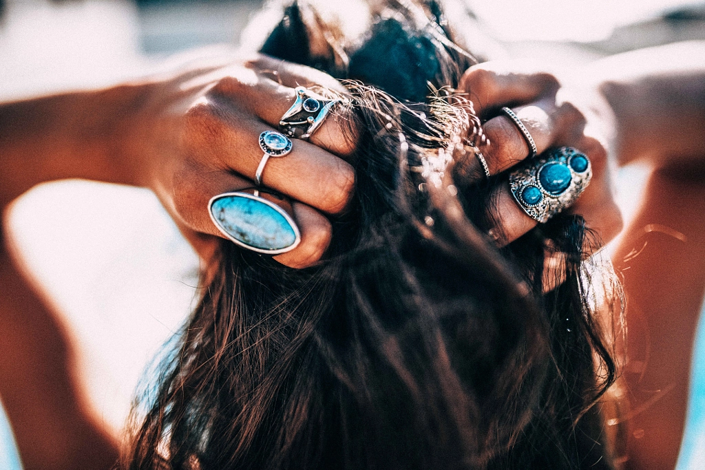 Close up of Women with bohemian style jewellery rings on hands by Carina König on 500px