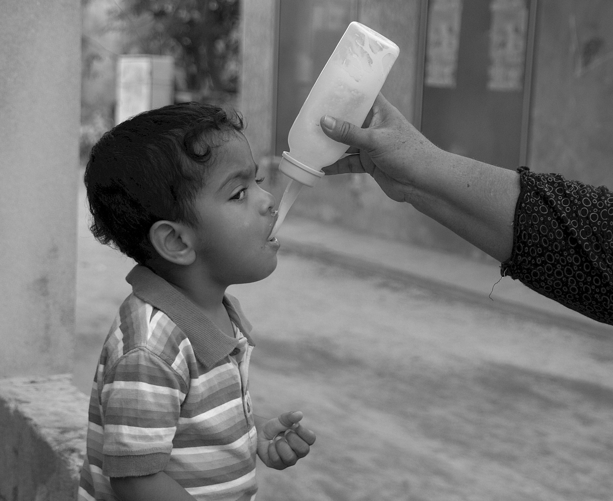 Sony SLT-A33 + Tamron 18-270mm F3.5-6.3 Di II PZD sample photo. Burma 97 (faces of burma) spoonbottle storys photography