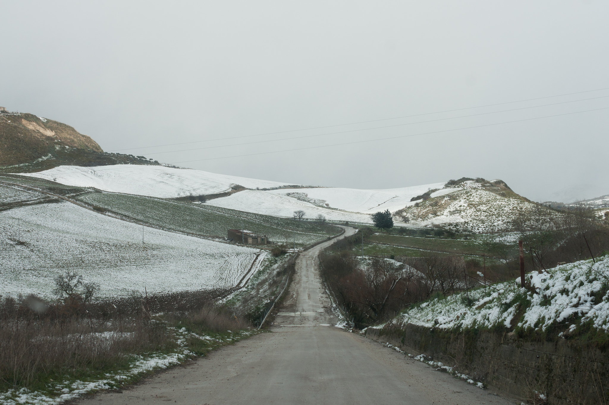 Minolta AF 28-85mm F3.5-4.5 sample photo. Street view of a snow landscape in sicily photography