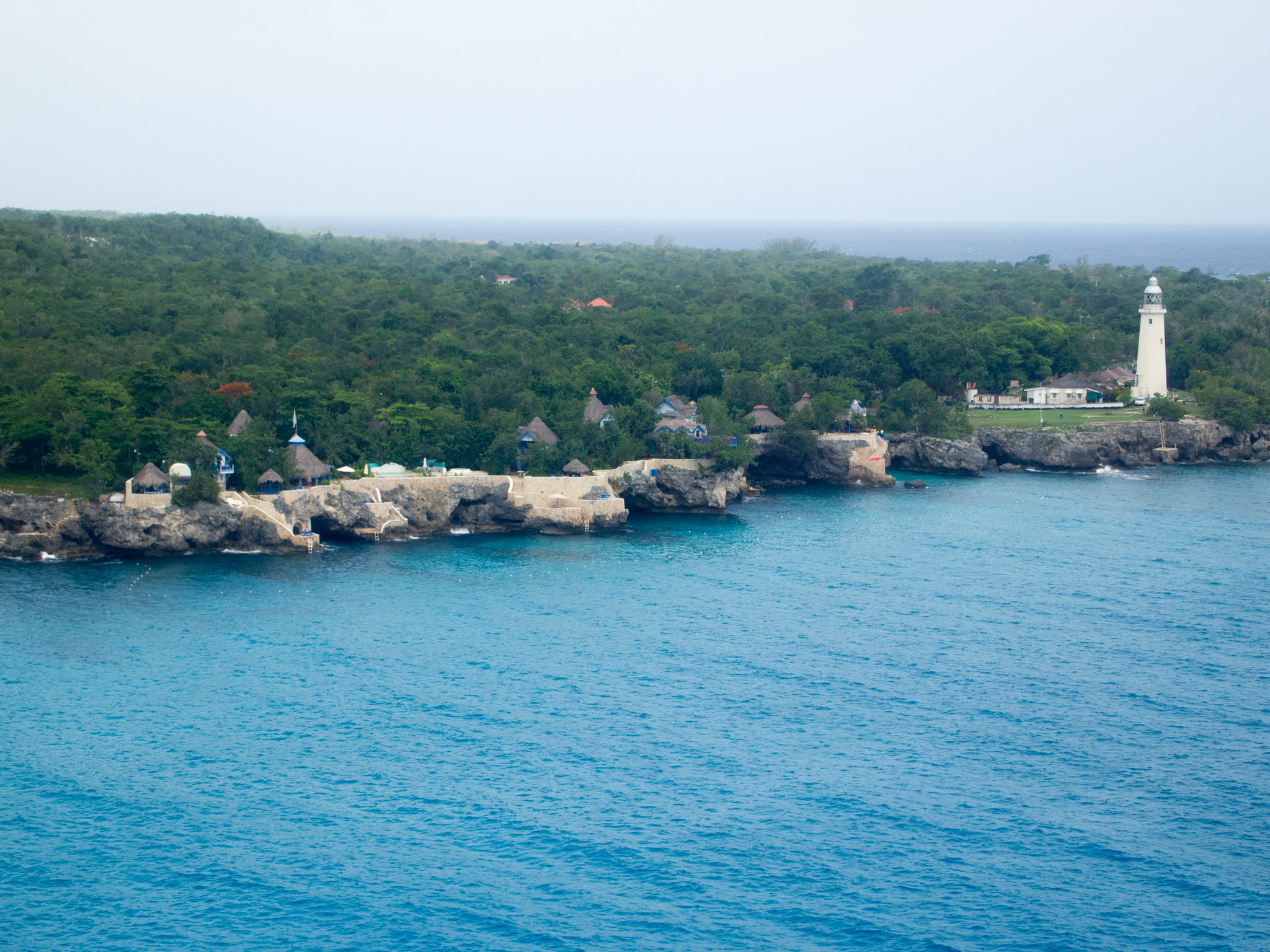 Olympus PEN E-PL1 sample photo. Spa to lighthouse in the rain photography
