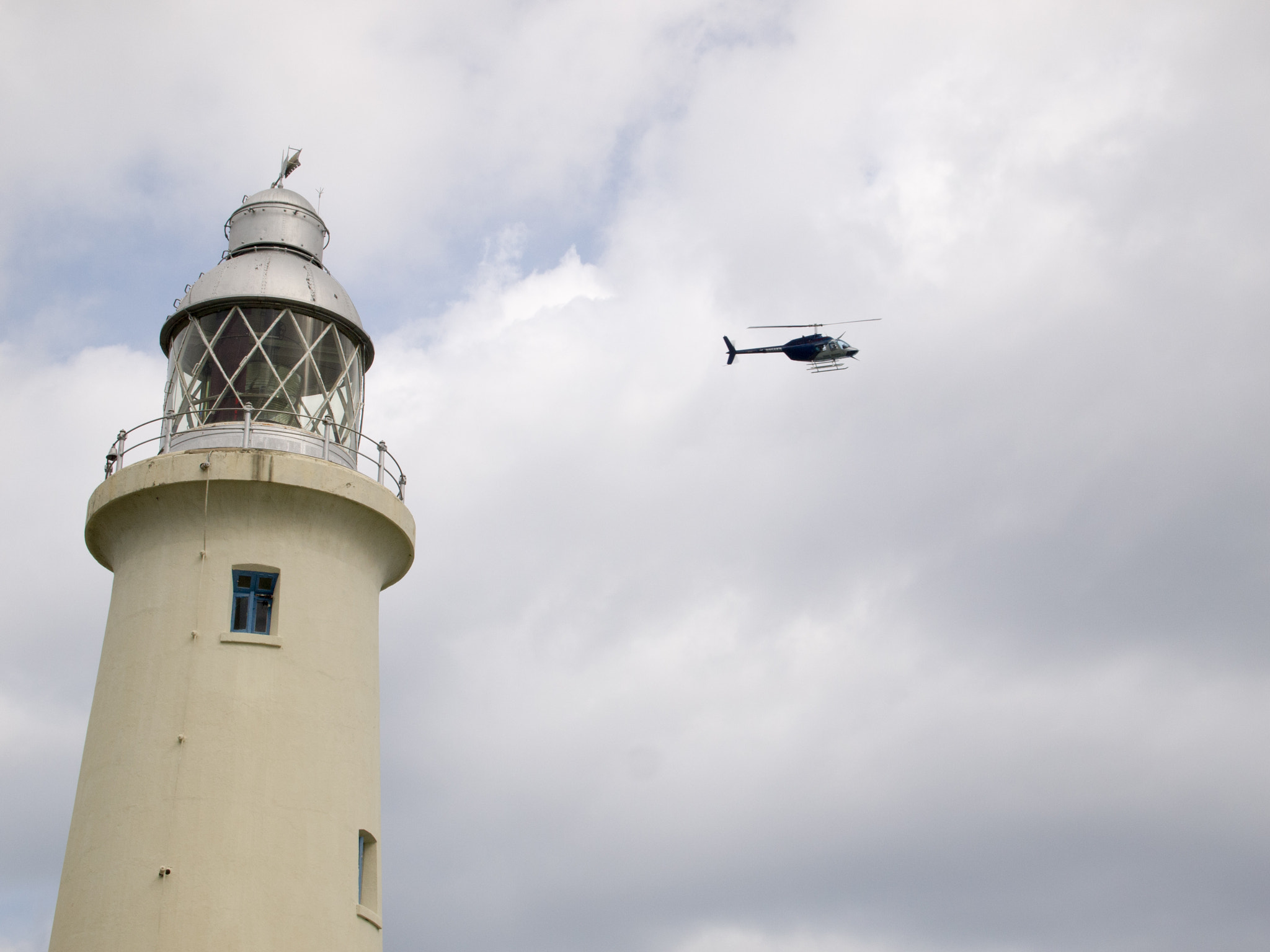 Olympus PEN E-PL1 sample photo. Helicopter at the negril lighthouse photography