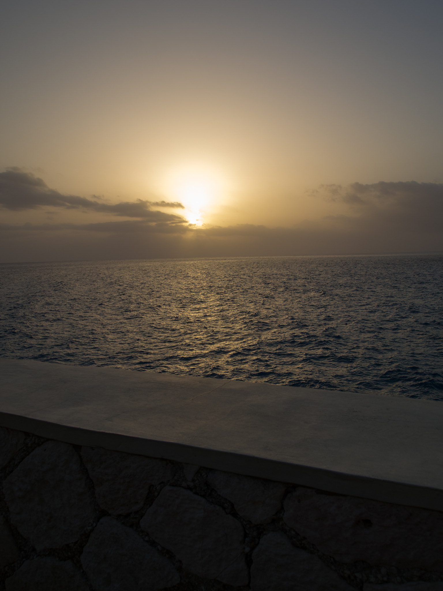 Olympus PEN E-PL1 sample photo. Sunset over wall at the pool photography