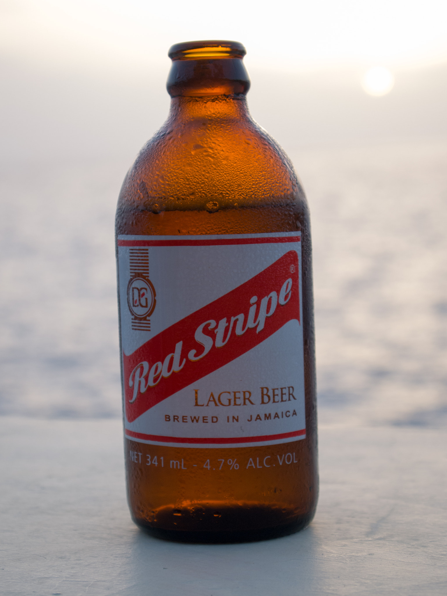 Olympus PEN E-PL1 sample photo. Red stripe cliffside below sundancer photography