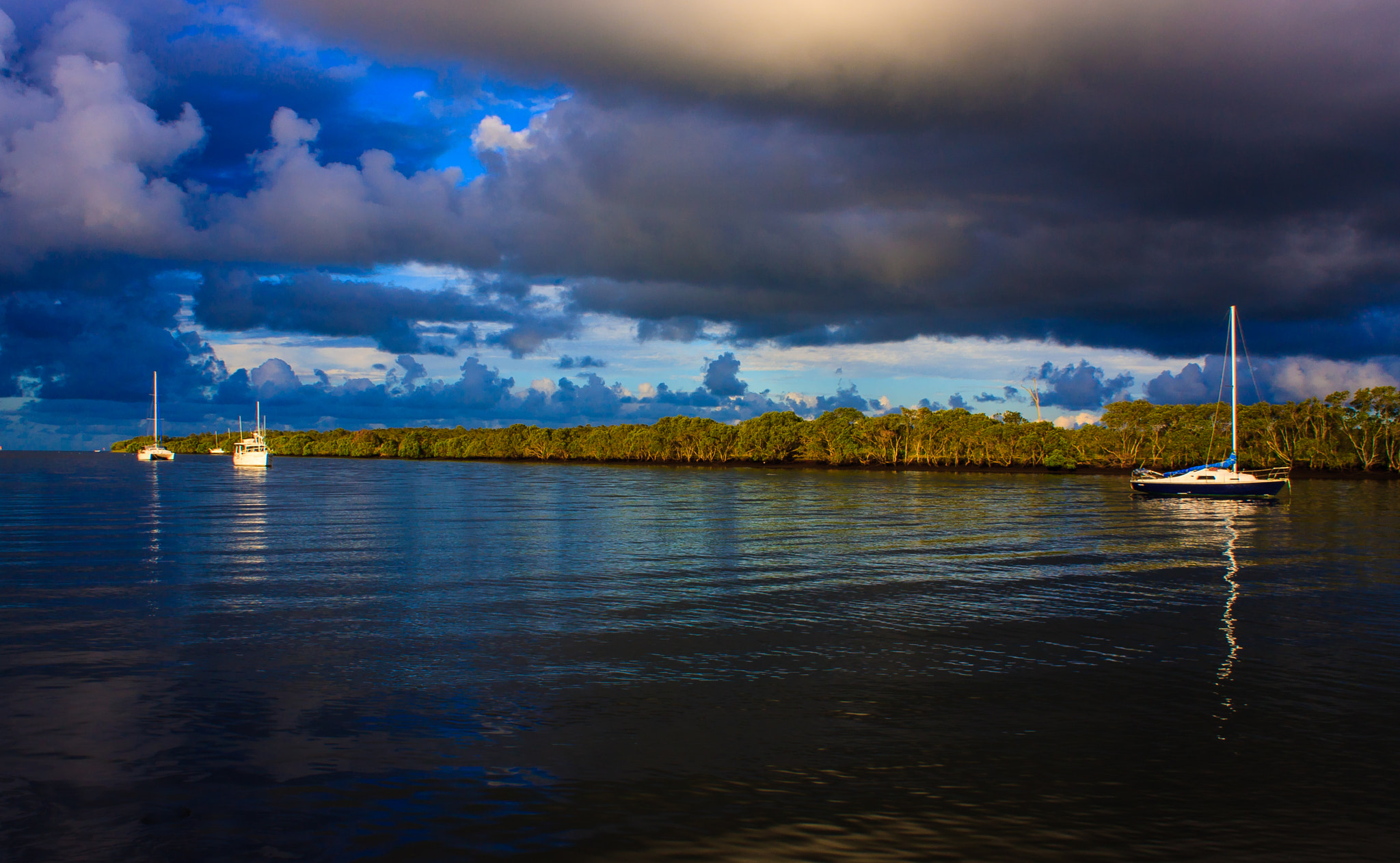 Canon EOS 40D sample photo. Storm clouds over yachts at anchor photography