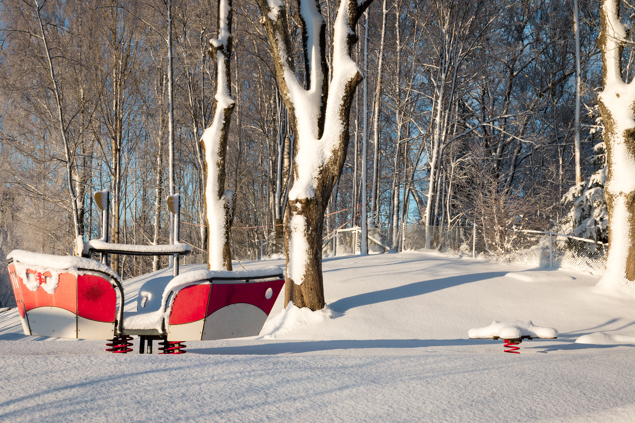 Canon EOS 70D + Canon EF 35mm F1.4L USM sample photo. Snowed in playground in sunshine photography