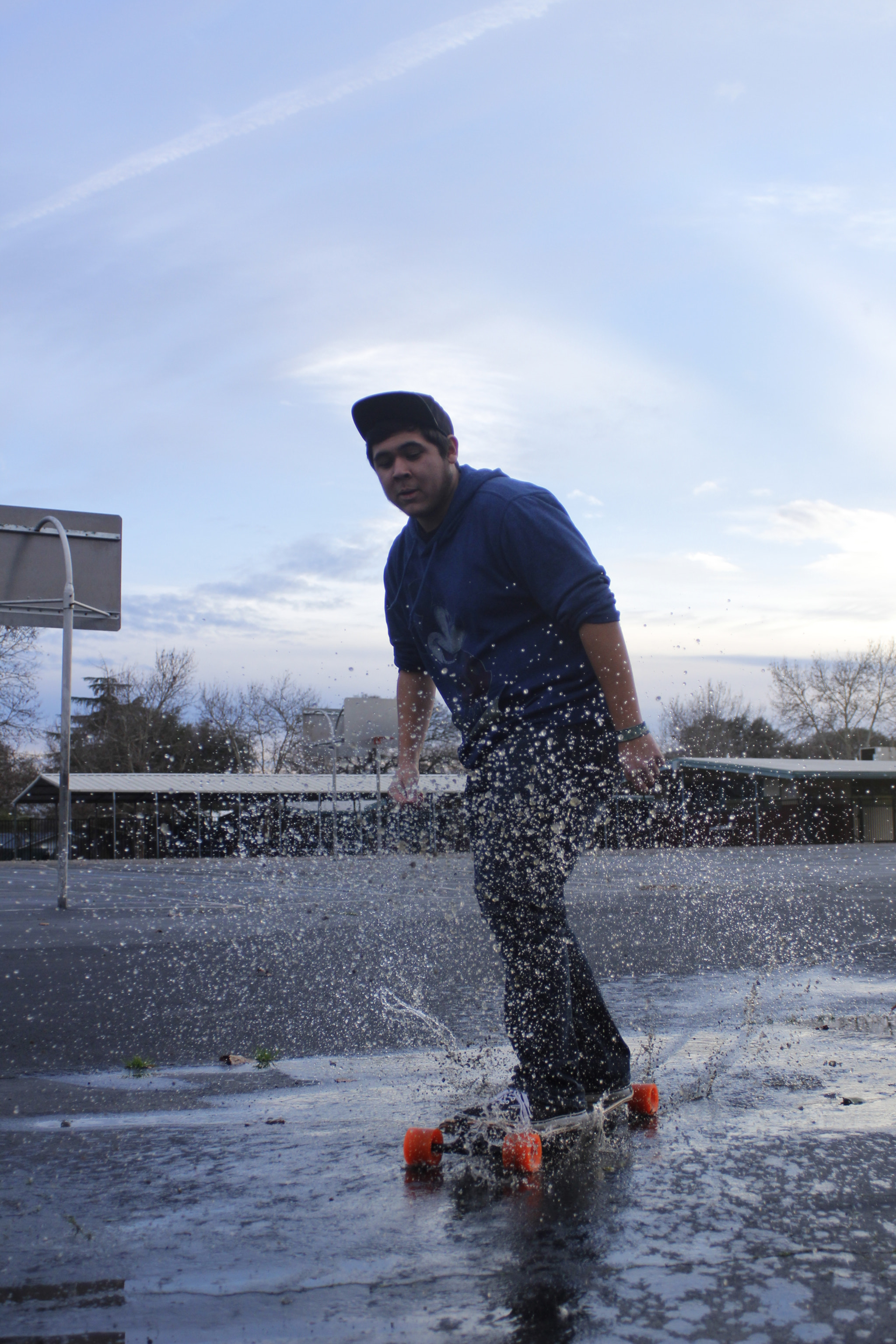 Canon EF 28-90mm f/4-5.6 sample photo. Making his splash photography