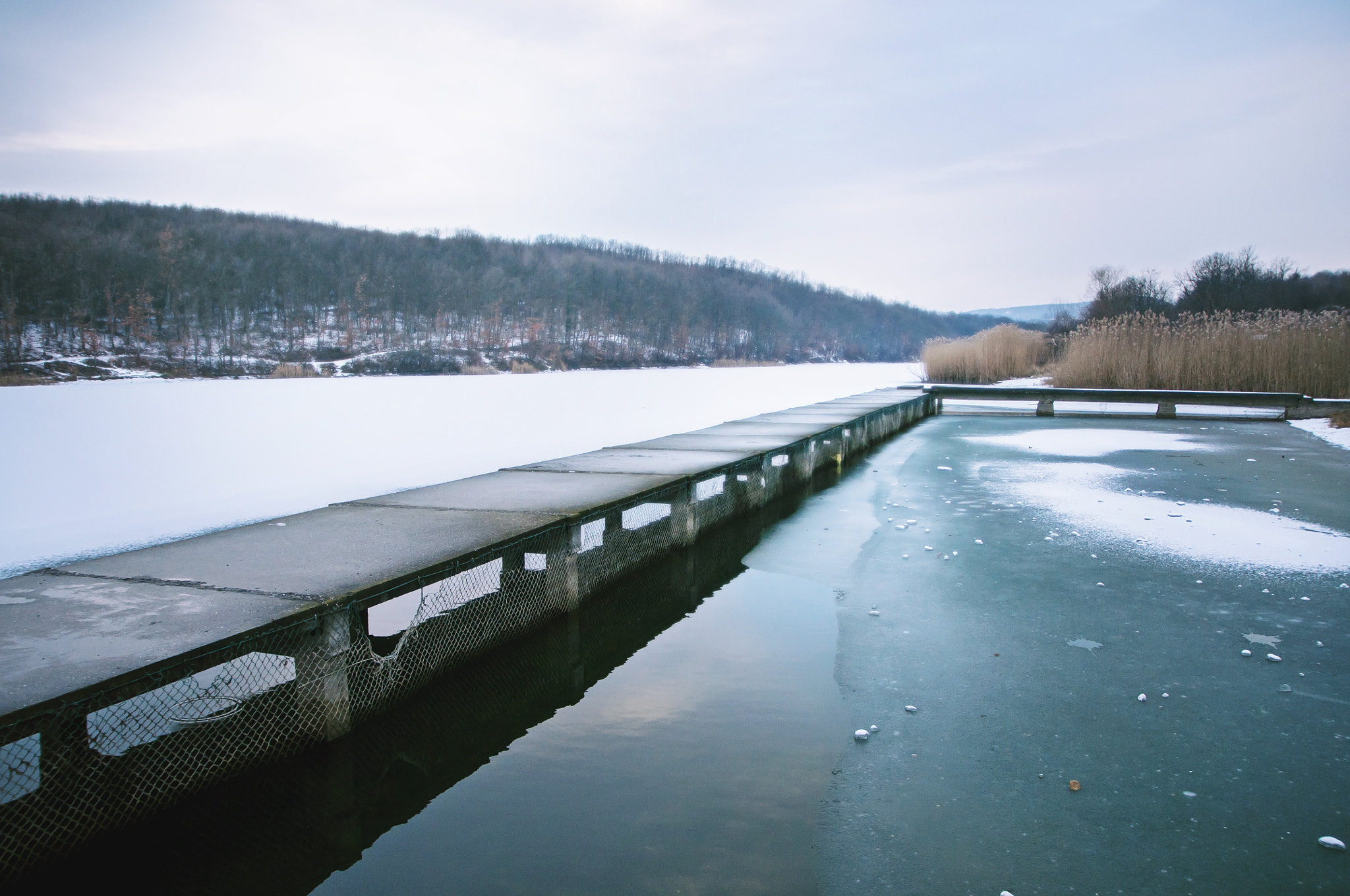 Nikon D5000 + Sigma 17-70mm F2.8-4 DC Macro OS HSM sample photo. Frozen lake photography