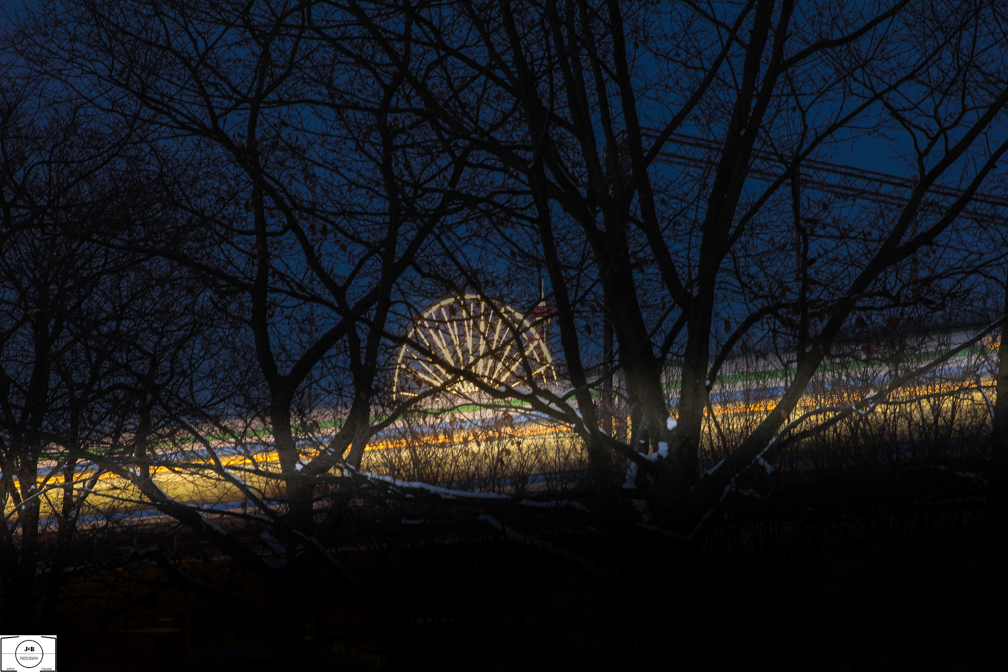 Canon EF 24-70mm F2.8L II USM sample photo. Ferris wheel with train pasisng by photography