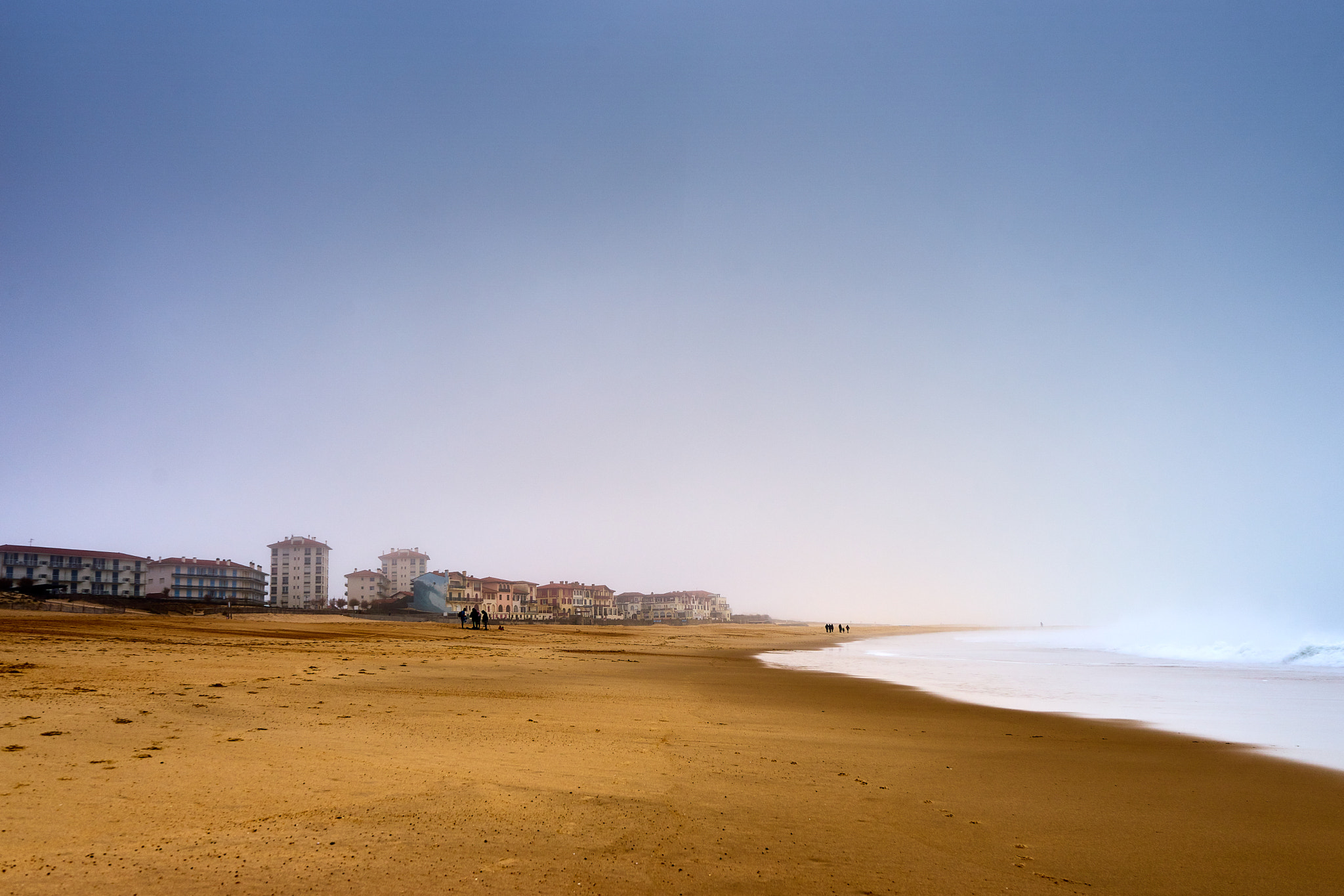 Sony FE 28-70mm F3.5-5.6 OSS sample photo. Enjoying the foggy beach photography